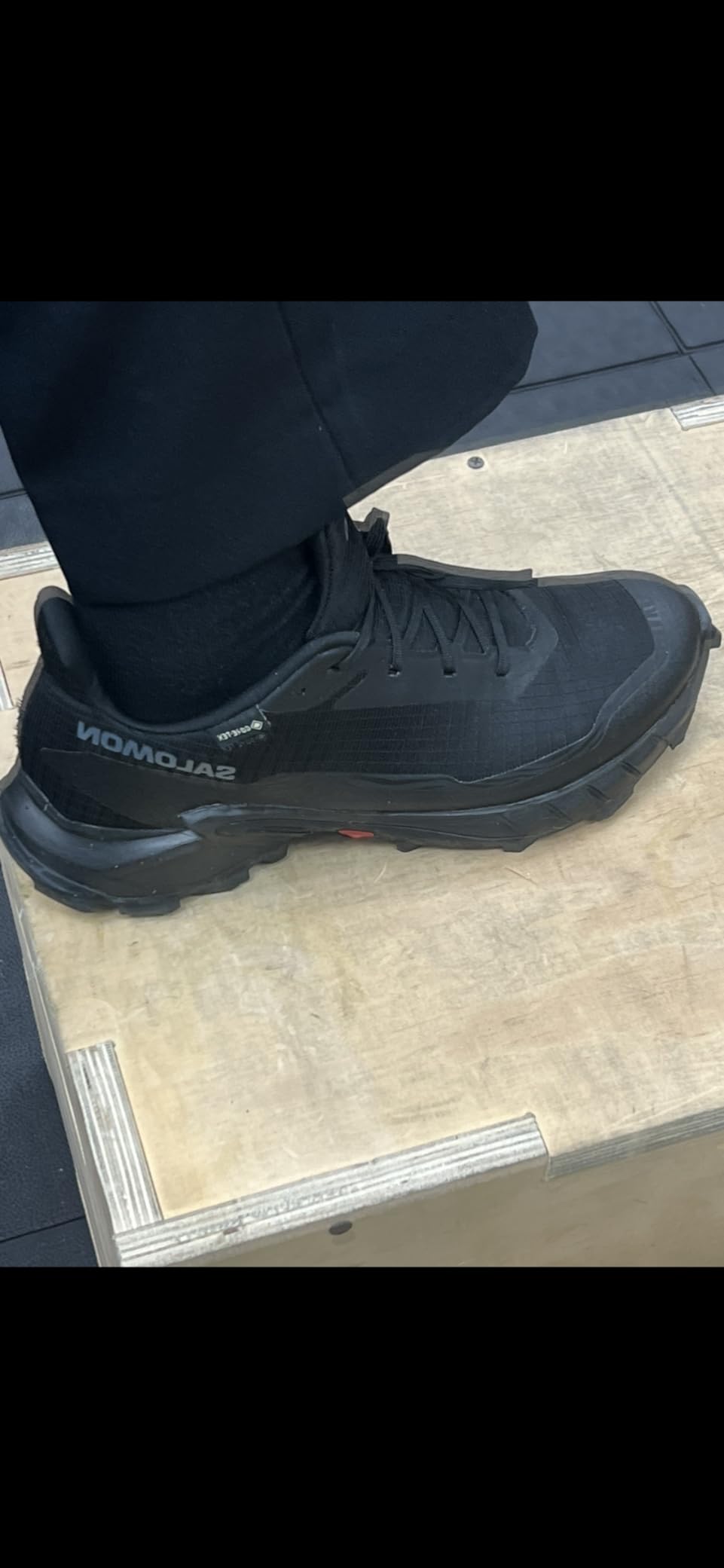 Salomon Alphacross 5 Gore-Tex midsole showing Fuze Foam cushioning system