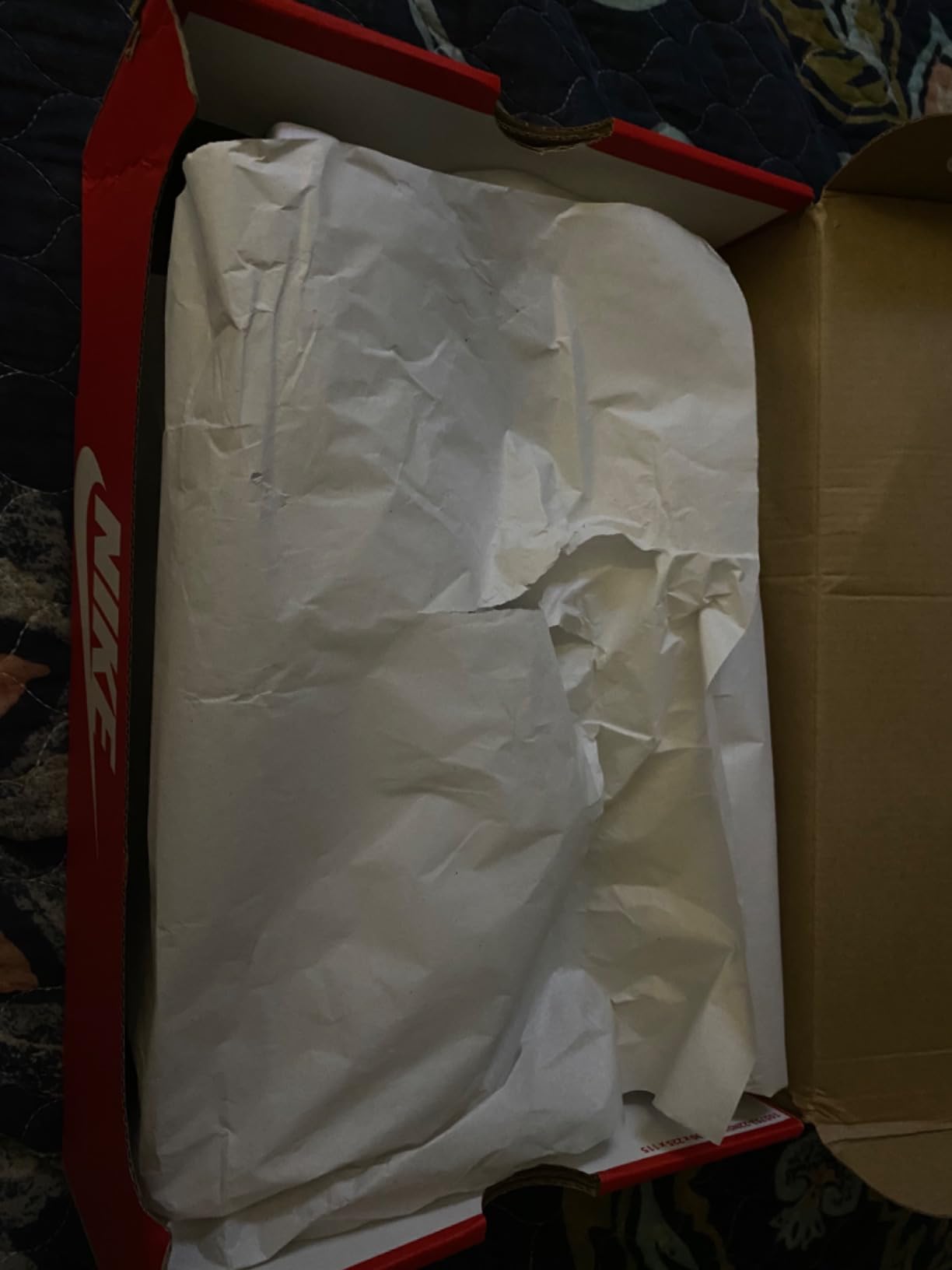 Nike Ebernon Low side profile showing classic basketball silhouette and 80s retro design elements with genuine leather construction