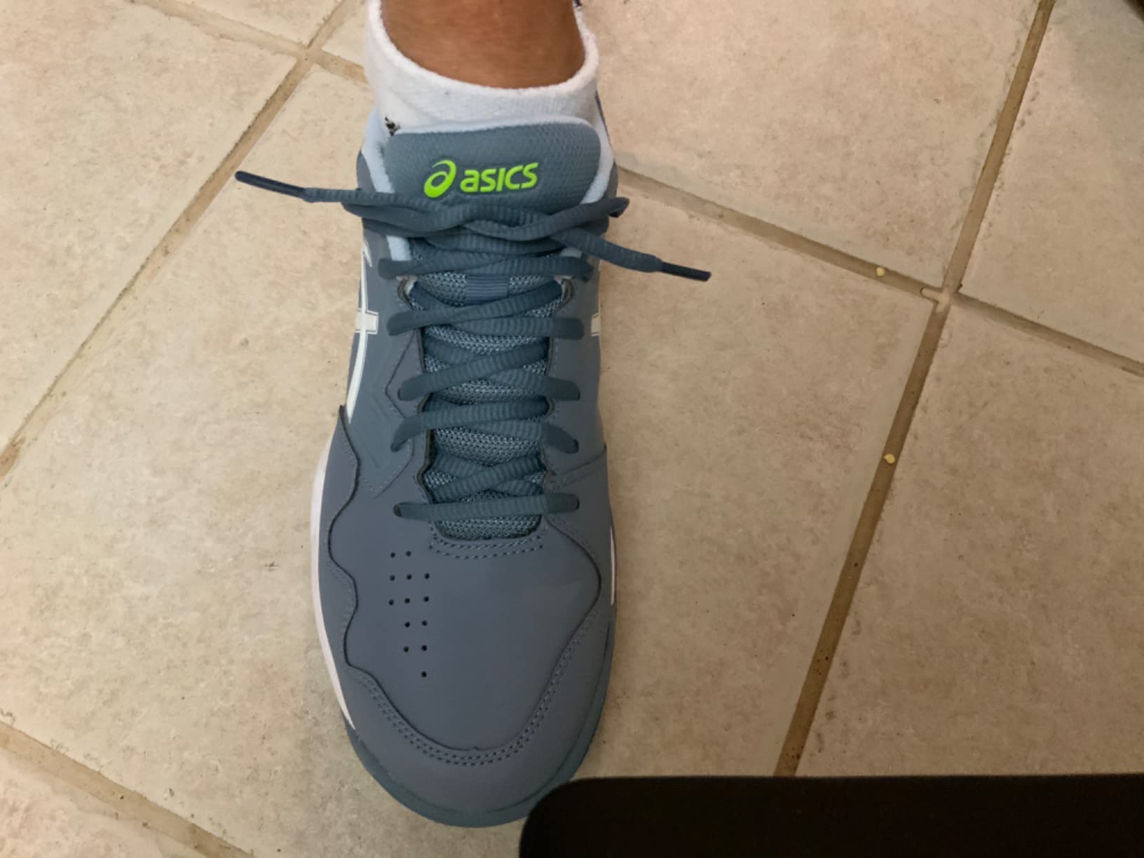 ASICS Gel-Dedicate 7 tennis shoes showing lacing system and overall court shoe design