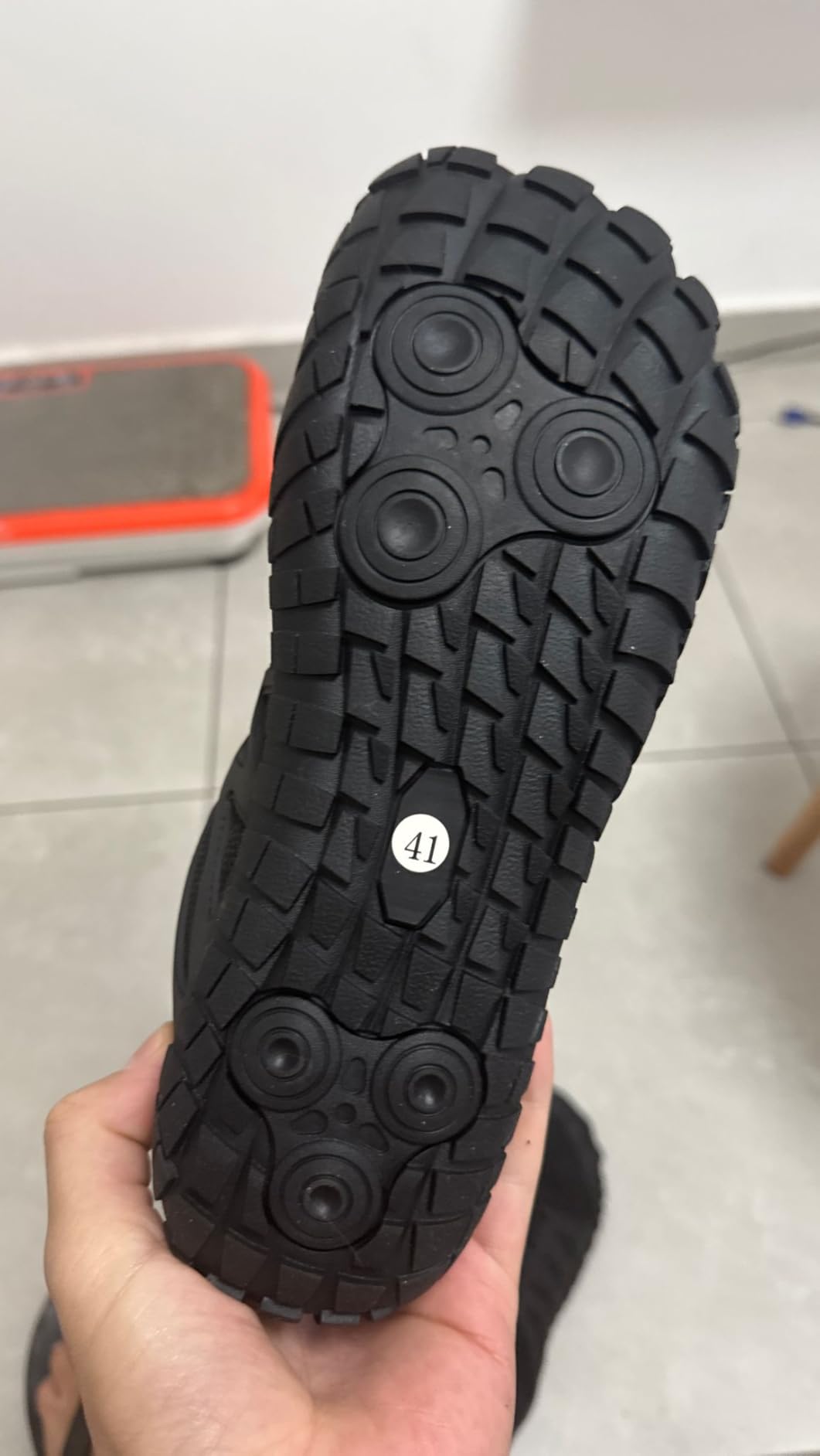Oranginer barefoot shoe side profile showing minimal heel construction and breathable synthetic mesh upper design