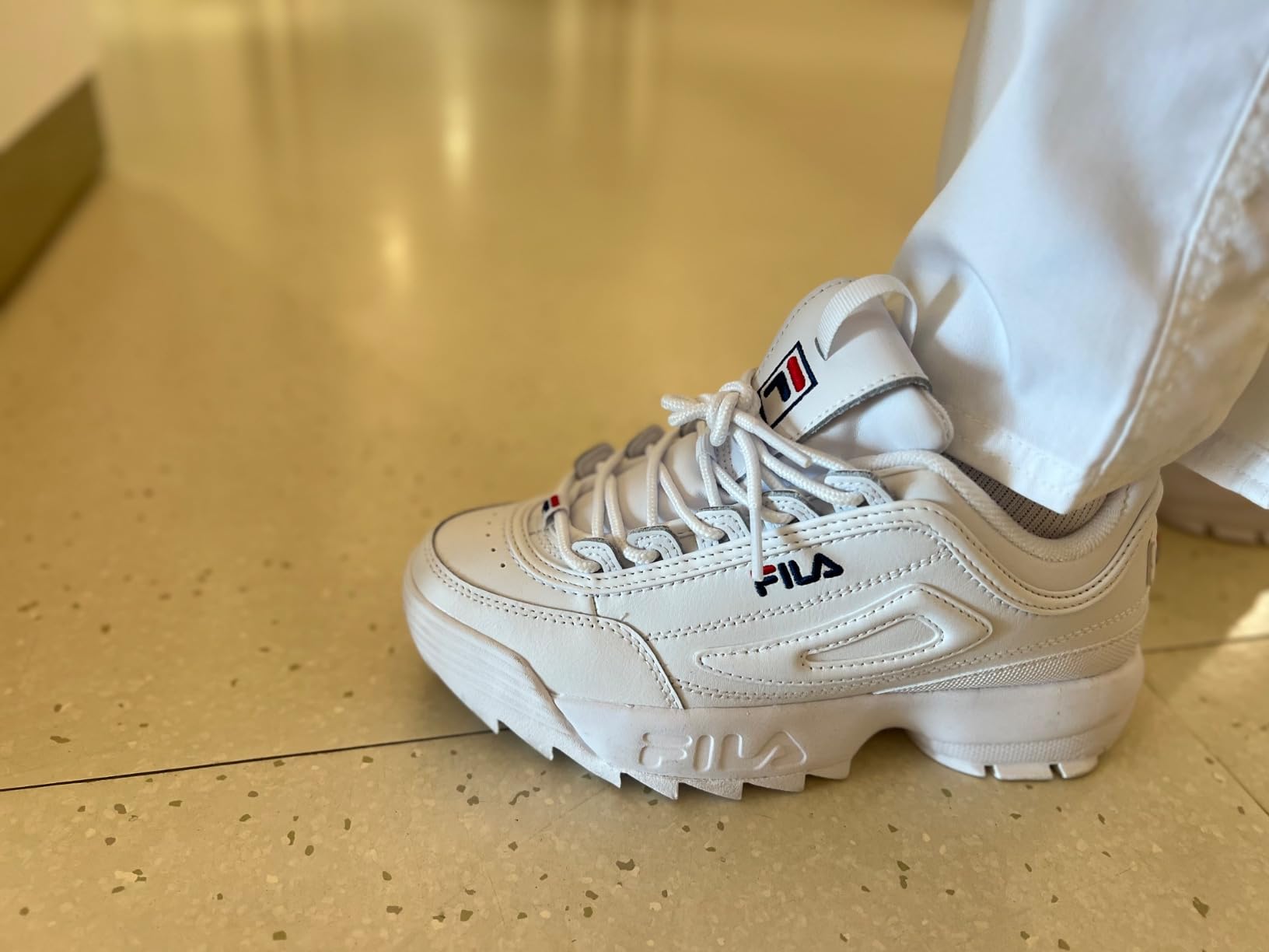 Close-up view of Fila Disruptor II upper material and construction detail