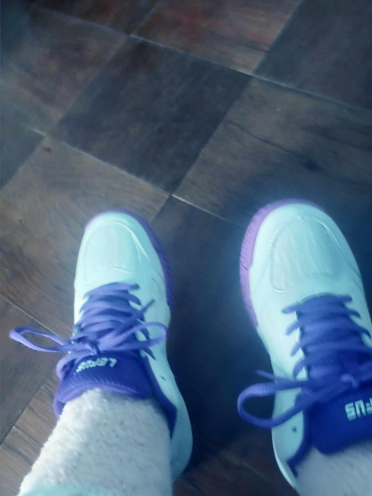 LEFUS P601 close-up showing mesh construction and purple accent details on upper