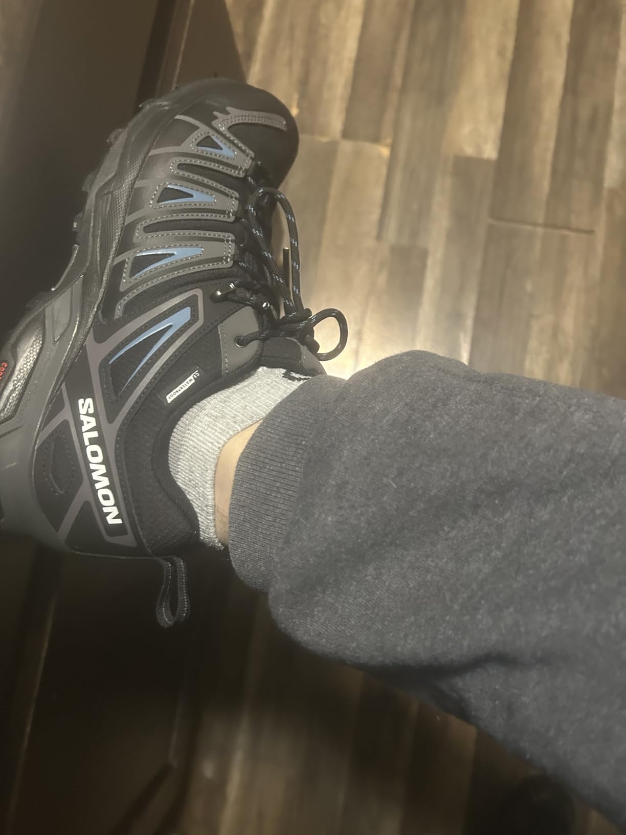 Salomon X Ultra Pioneer Climasalomon Waterproof hiking shoes black colorway showing full profile and Advanced Chassis design