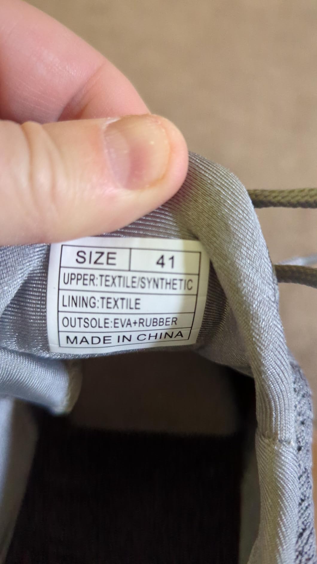 Close-up view of Feethit walking shoes mesh construction and elastic lacing detail