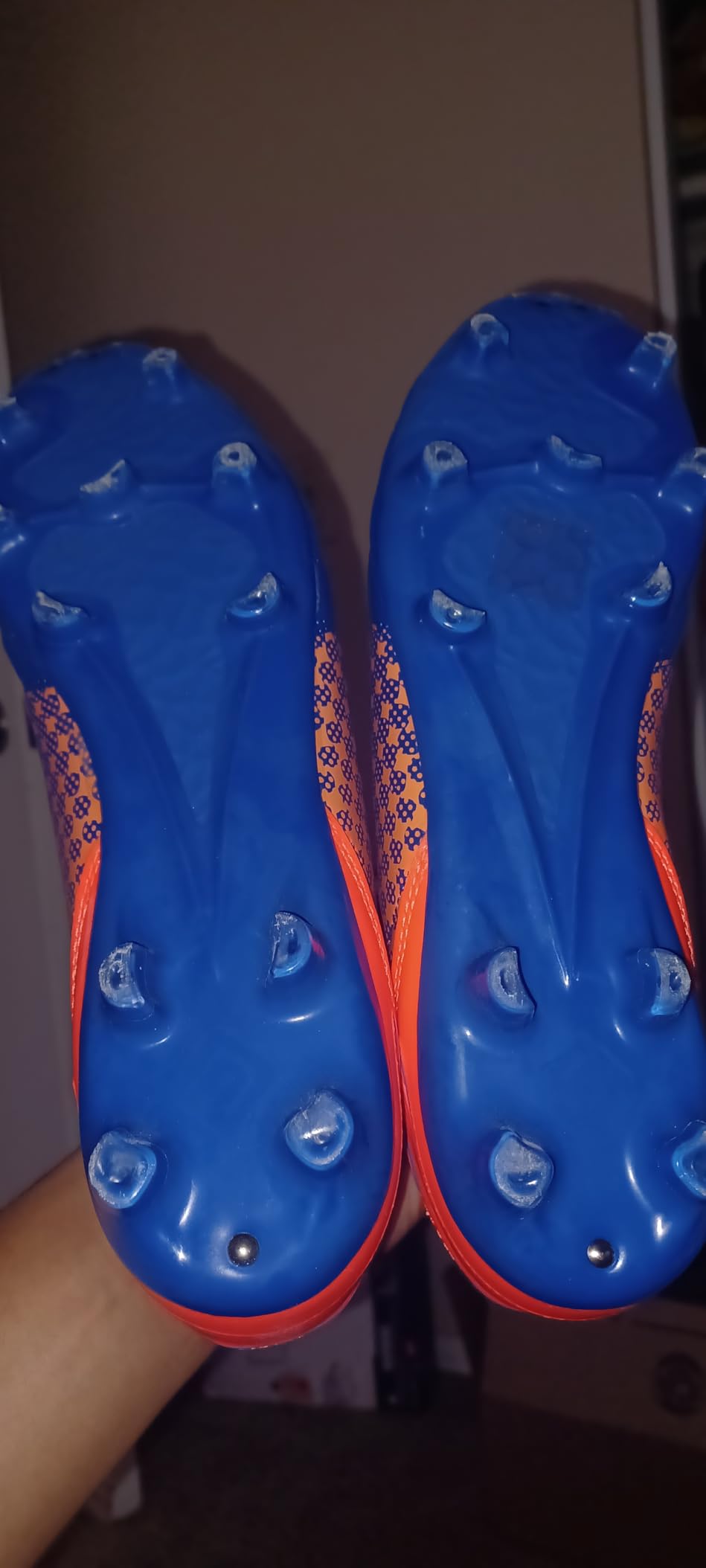 Detailed view of DREAM PAIRS cleat sole showing TPU stud configuration