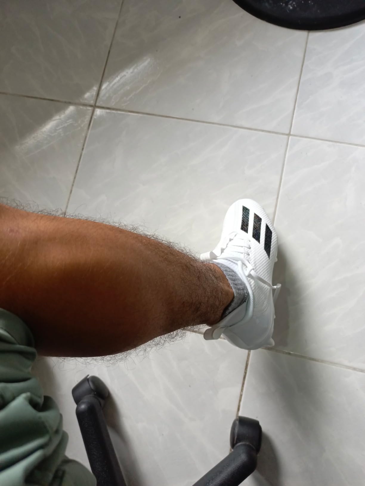 Close-up of Adidas Adizero Scorch sole showing triangular Sprintstuds pattern and Superfly Plate construction