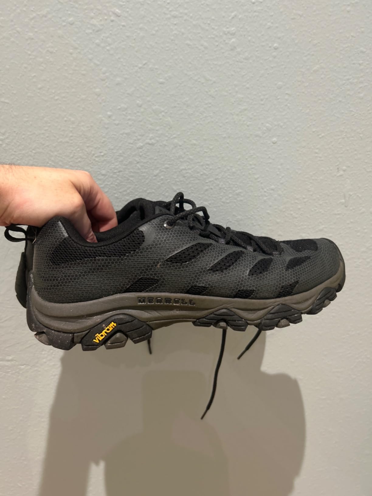 Close-up detail of Merrell Moab 3 Edge showing mesh upper construction and lacing system