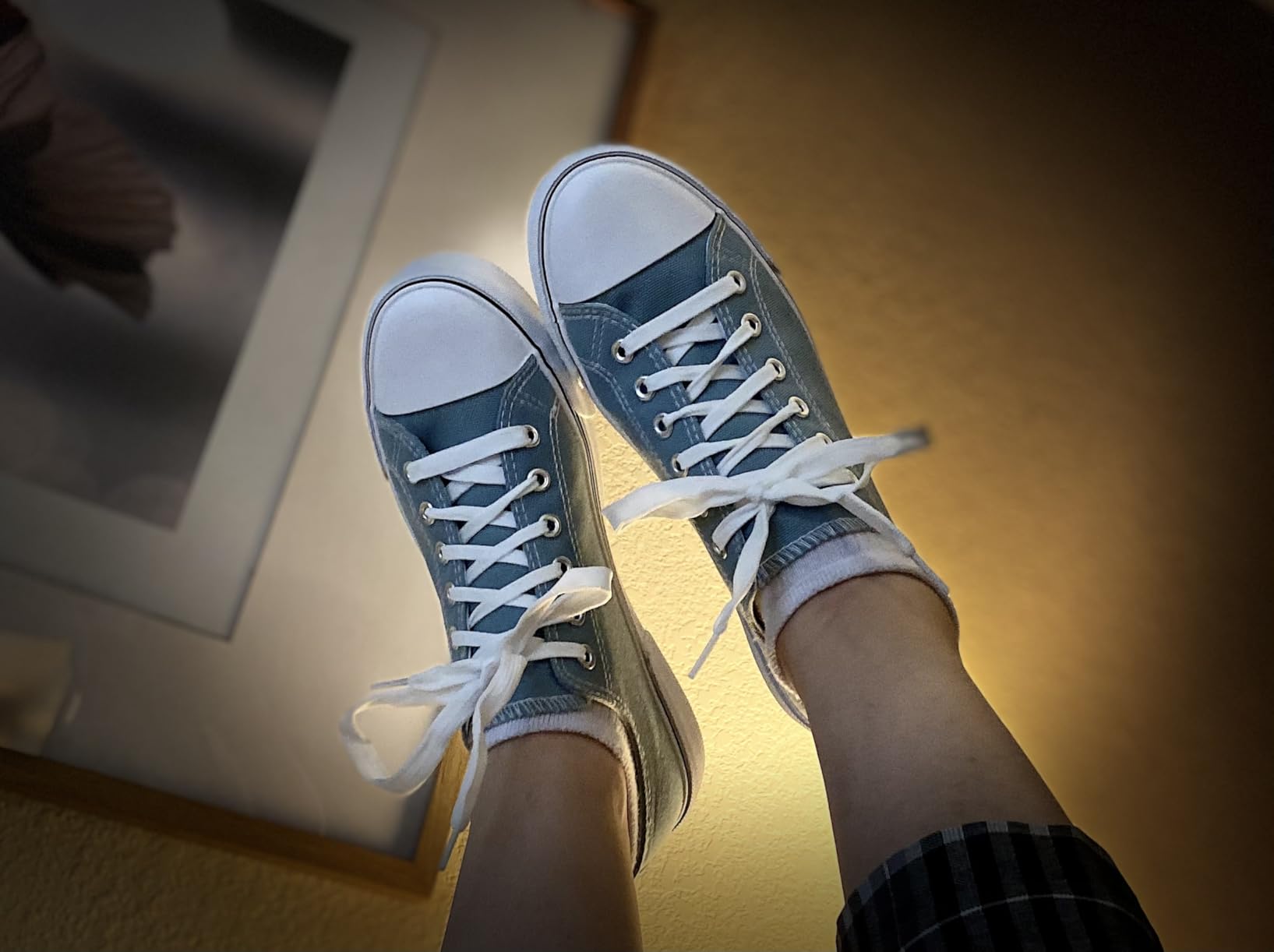 Side profile view of Adokoo sneaker showing rubber sole thickness and heel cup construction