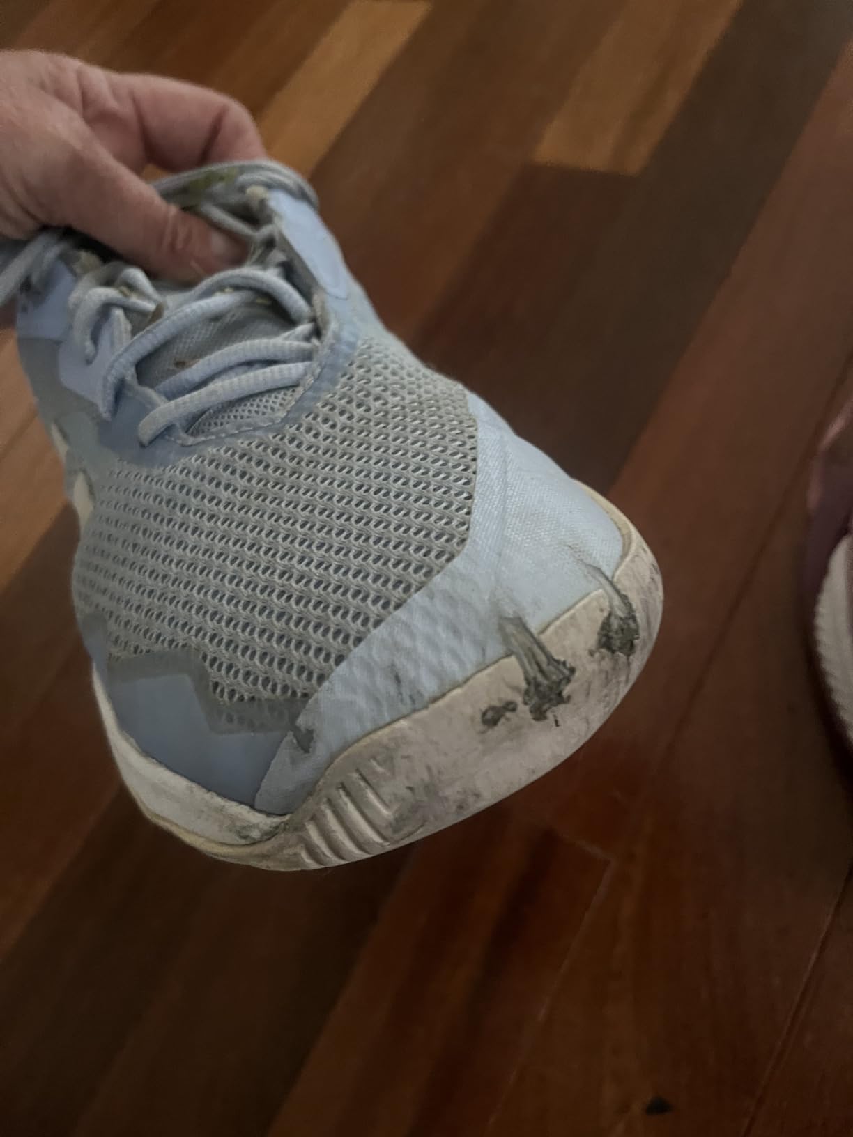 Close-up of K-Swiss Hypercourt Express 2 outsole showing Aosta 7.0 rubber modified herringbone traction pattern detail
