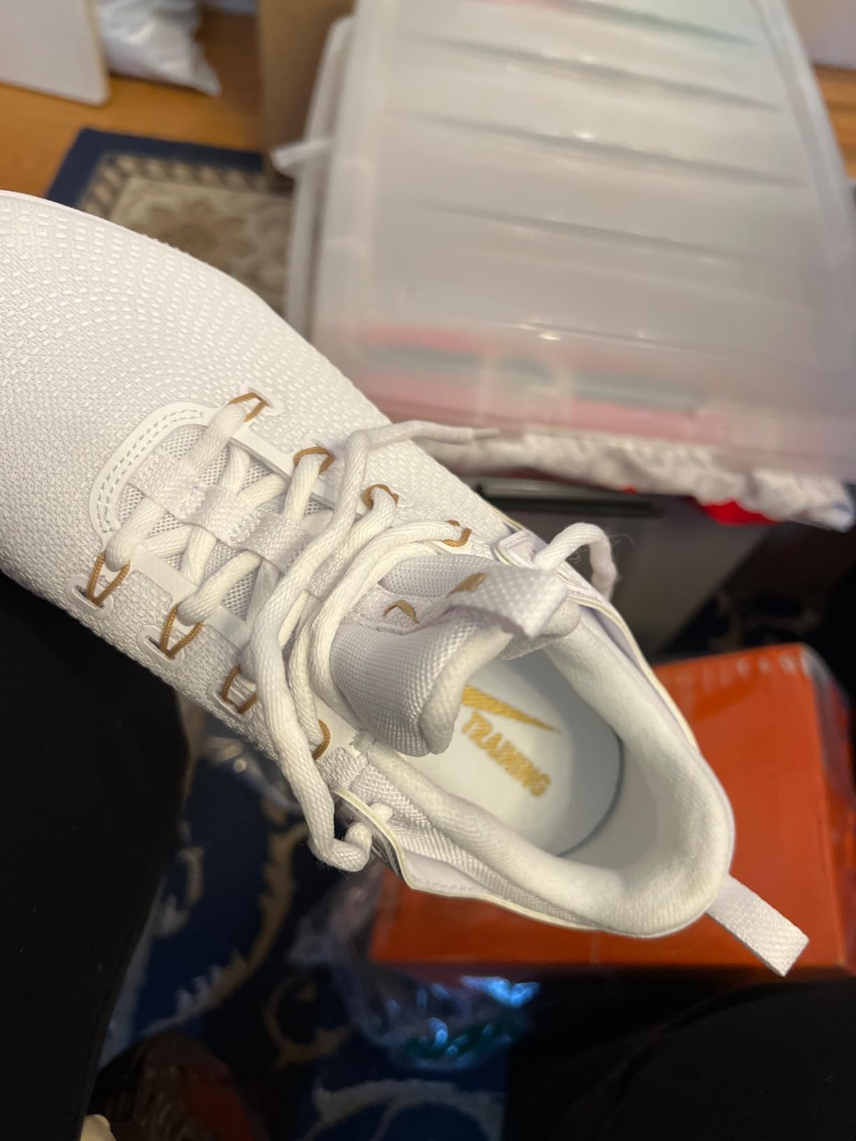 Nike volleyball shoes in original packaging showing quality control presentation