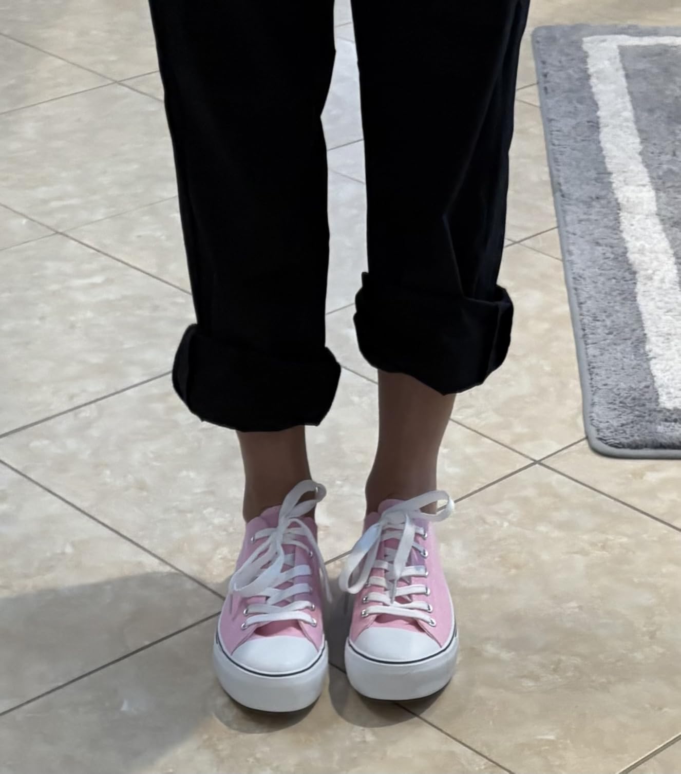 Multiple colorways of Adokoo canvas sneakers displayed together showing available color range