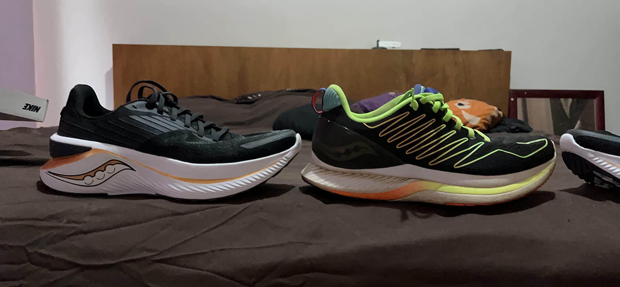 Bottom view of Saucony Endorphin Shift 3 showing XT-900 rubber outsole pattern and torsional heel groove