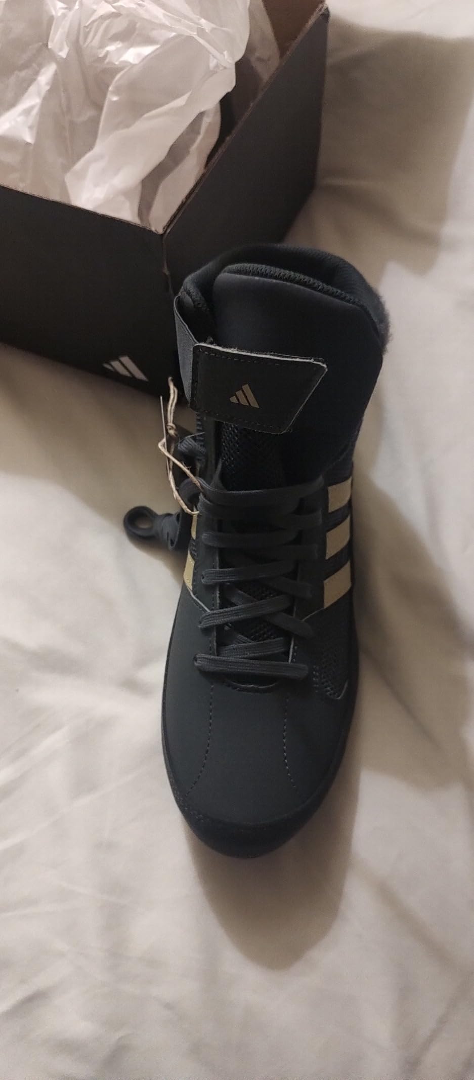 Adidas HVC Wrestling Shoes showing visible wear patterns after extended competition and practice use