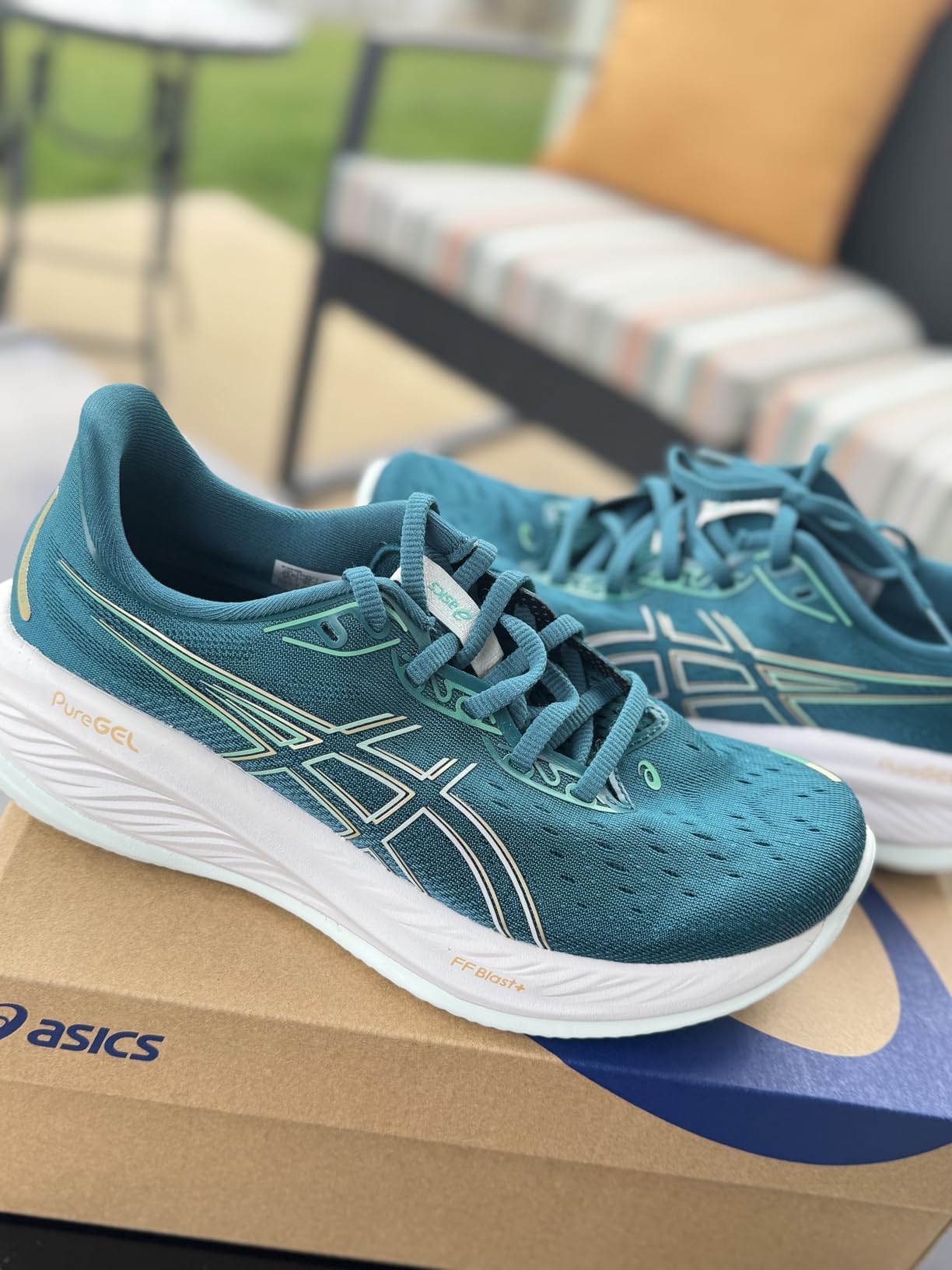 ASICS Gel-Cumulus 26 colorful design showing modern aesthetic and technical features