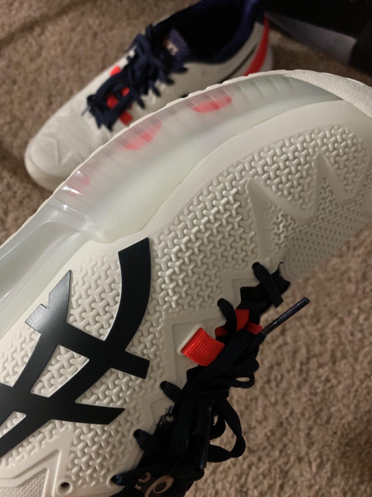 Close-up of ASICS Women's Gel-Resolution 8 upper construction showing Flexion Fit technology and lacing system