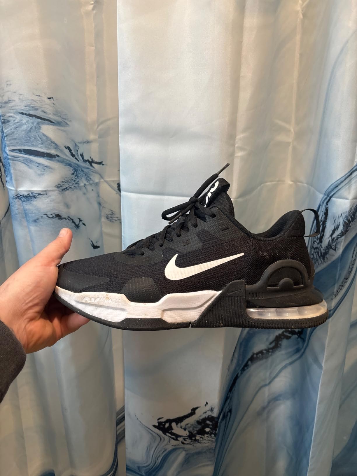Nike Air Max Alpha Trainer 5 construction detail showing synthetic leather mesh upper and sole attachment