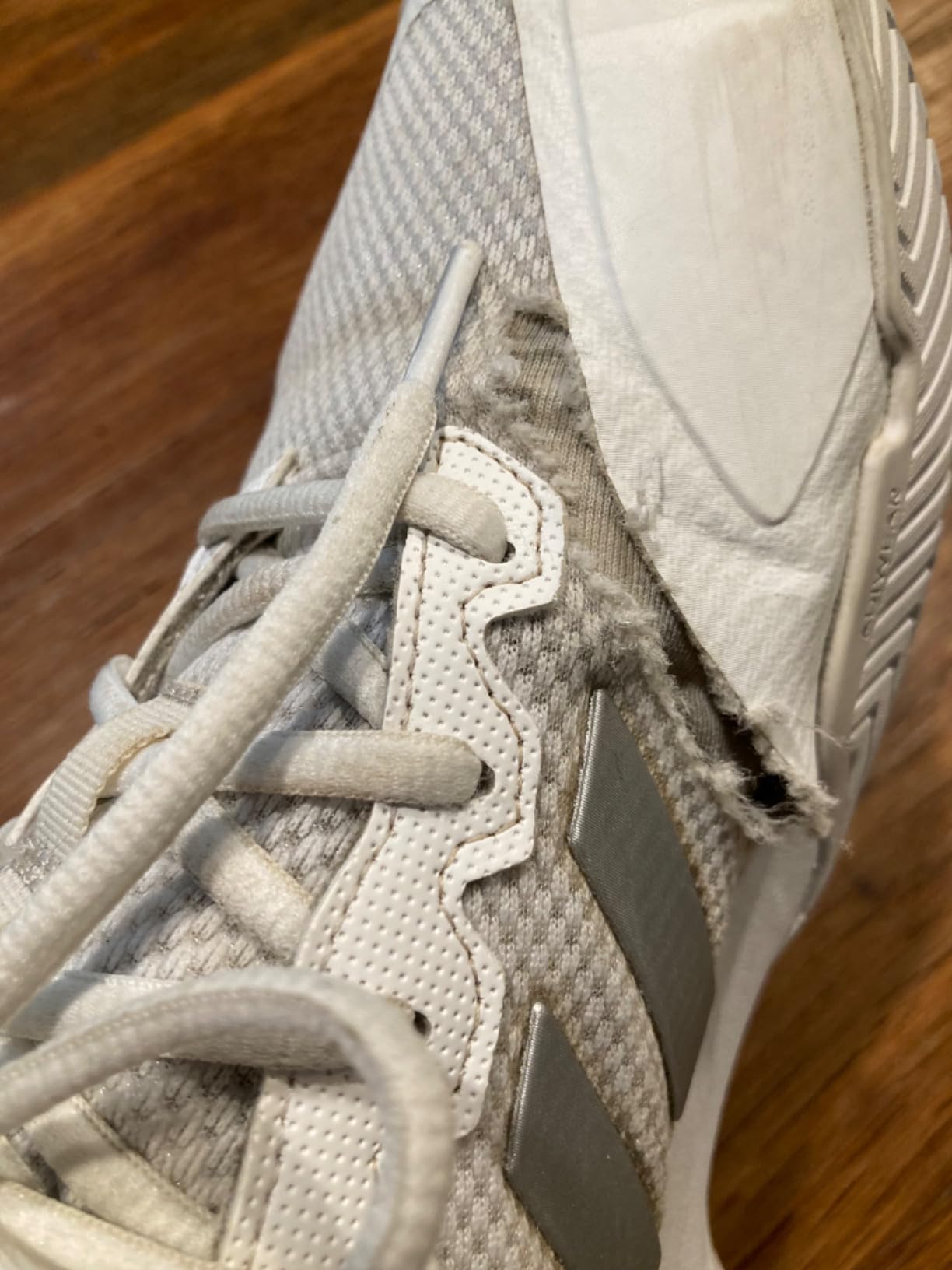 Adidas Gamecourt 2 after six months of use showing wear patterns at seam locations