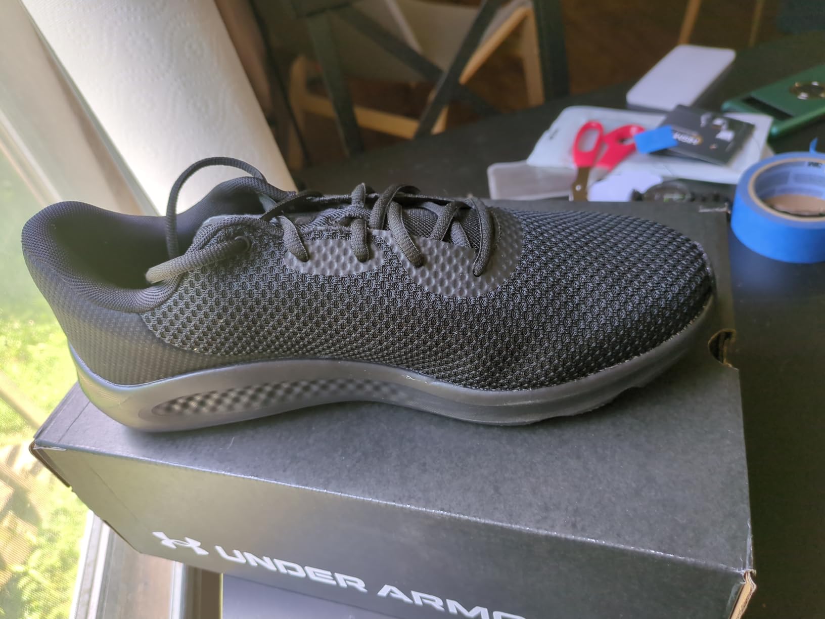 Under Armour Charged Pursuit 3 interior showing removable deluxe foam sockliner