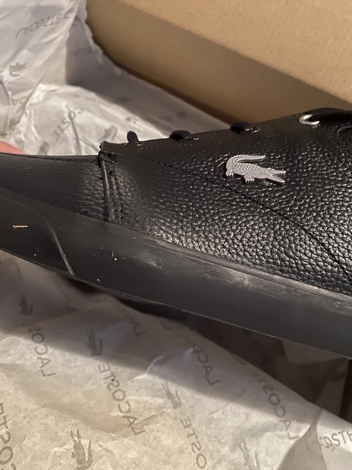 Lacoste Bayliss sneaker worn in real-world setting showing how they look with casual business attire