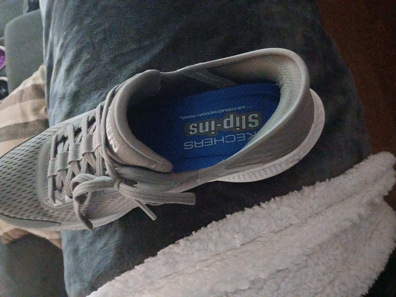 Skechers Go Run Consistent 2.0 Empowered lacing system detail showing slip-in mechanism