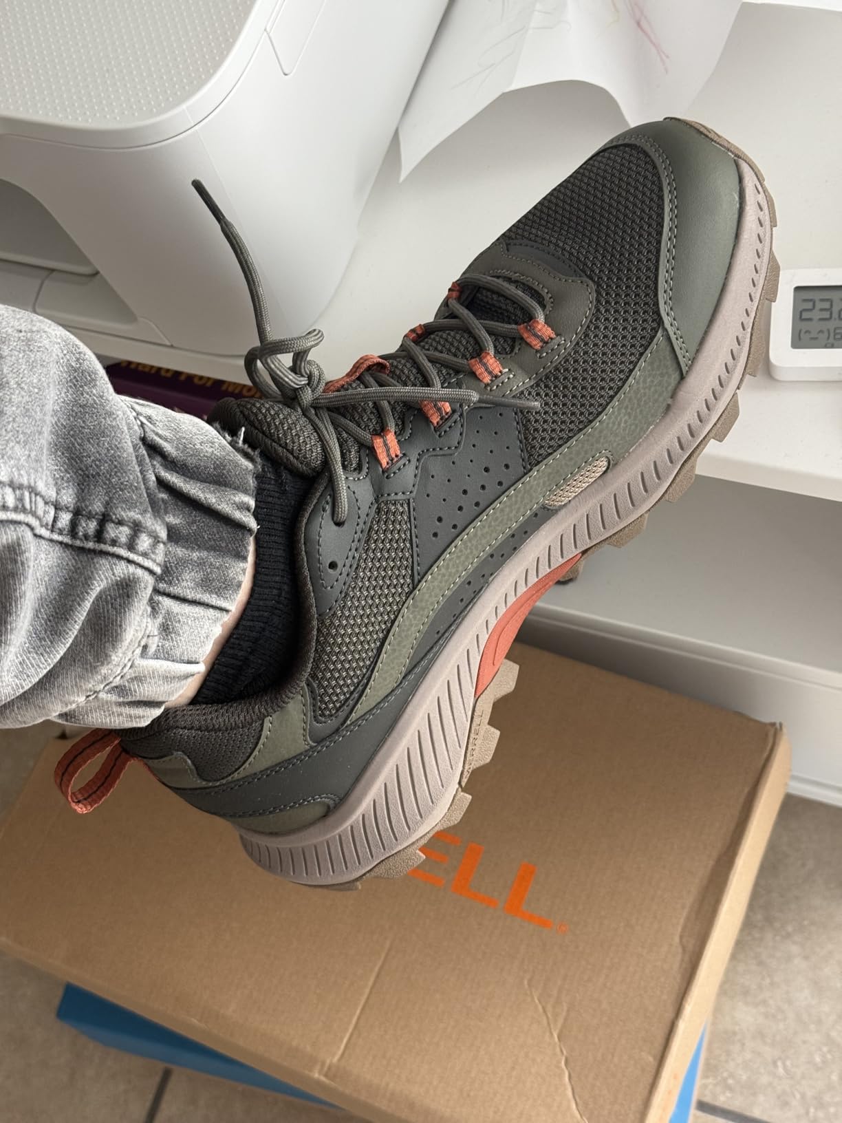 Merrell Speed Strike 2 mesh upper construction detail showing breathable synthetic weave and reinforced heel cap