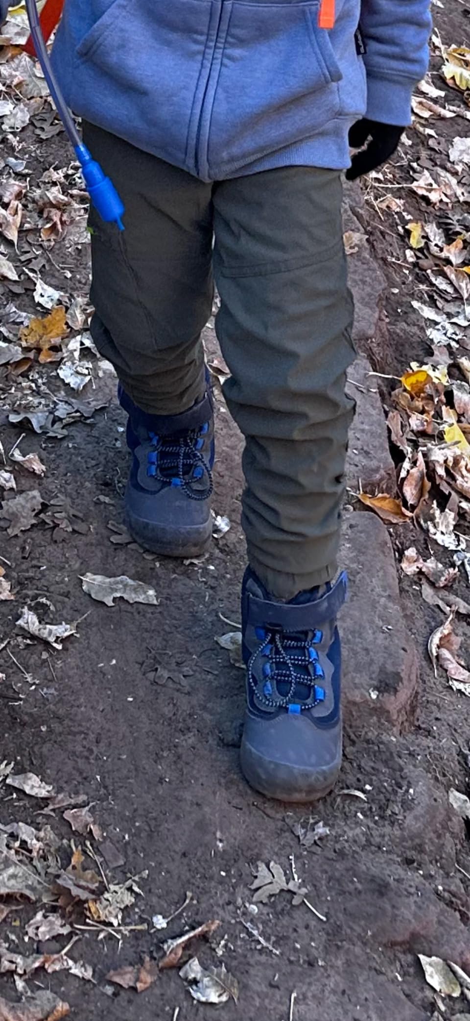 Bottom view of Mishansha kids hiking boots showing rubber tread pattern and anti-skid outsole design