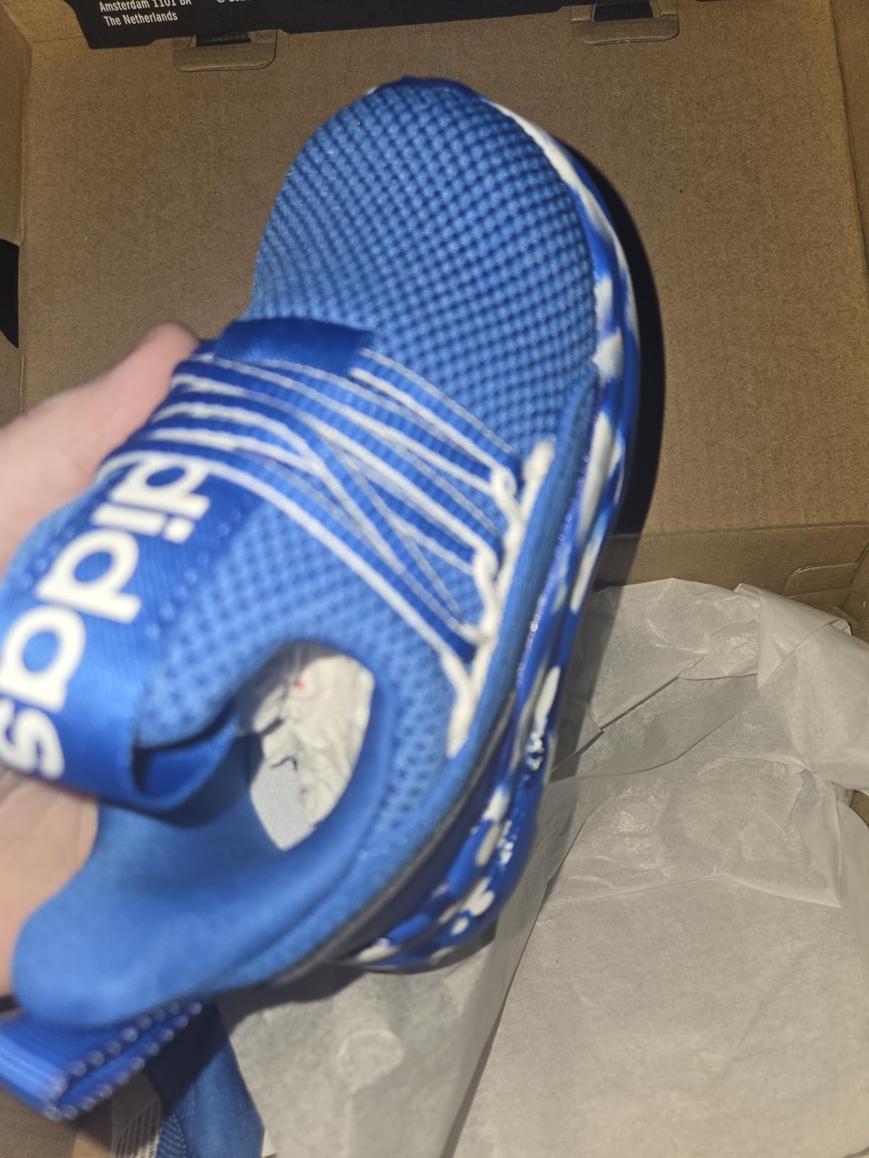 Adidas Lite Racer Adapt 7.0 colorway showing stretchy upper material detail