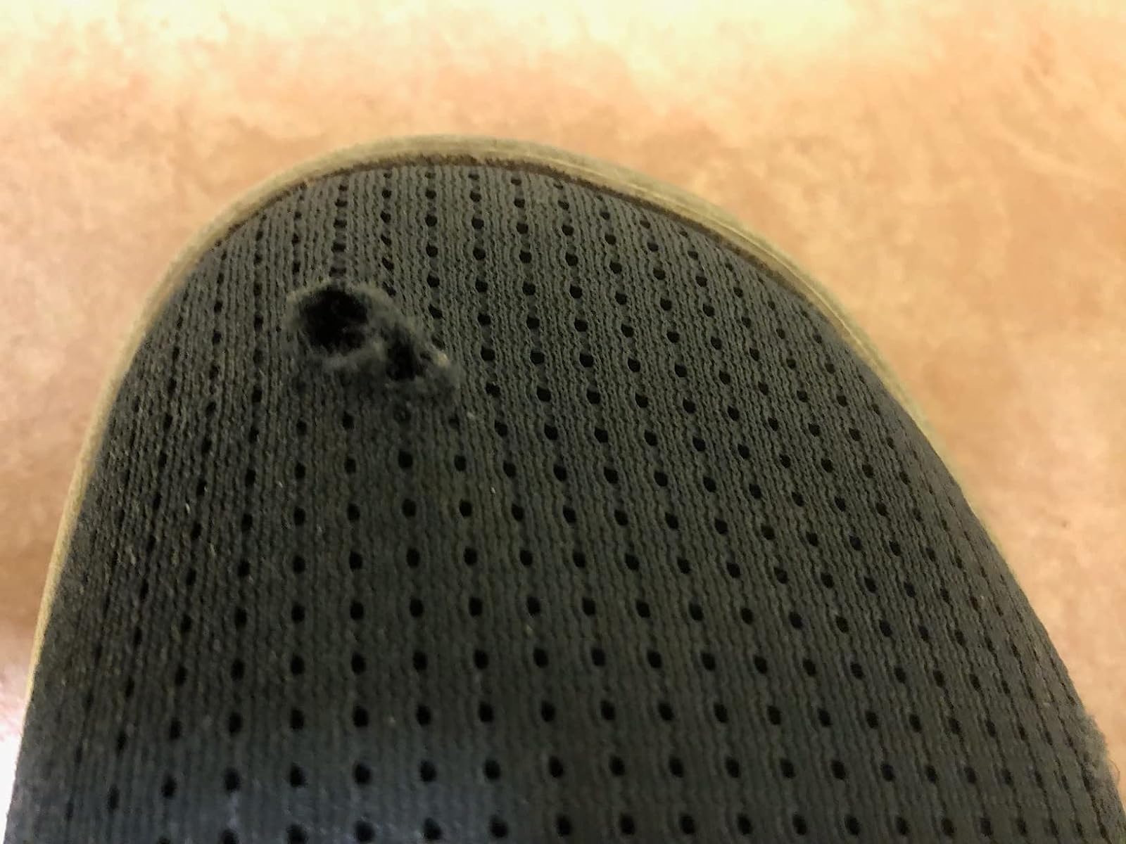 OLUKAI Nohea Moku showing toe area wear and durability concerns from extensive daily use testing