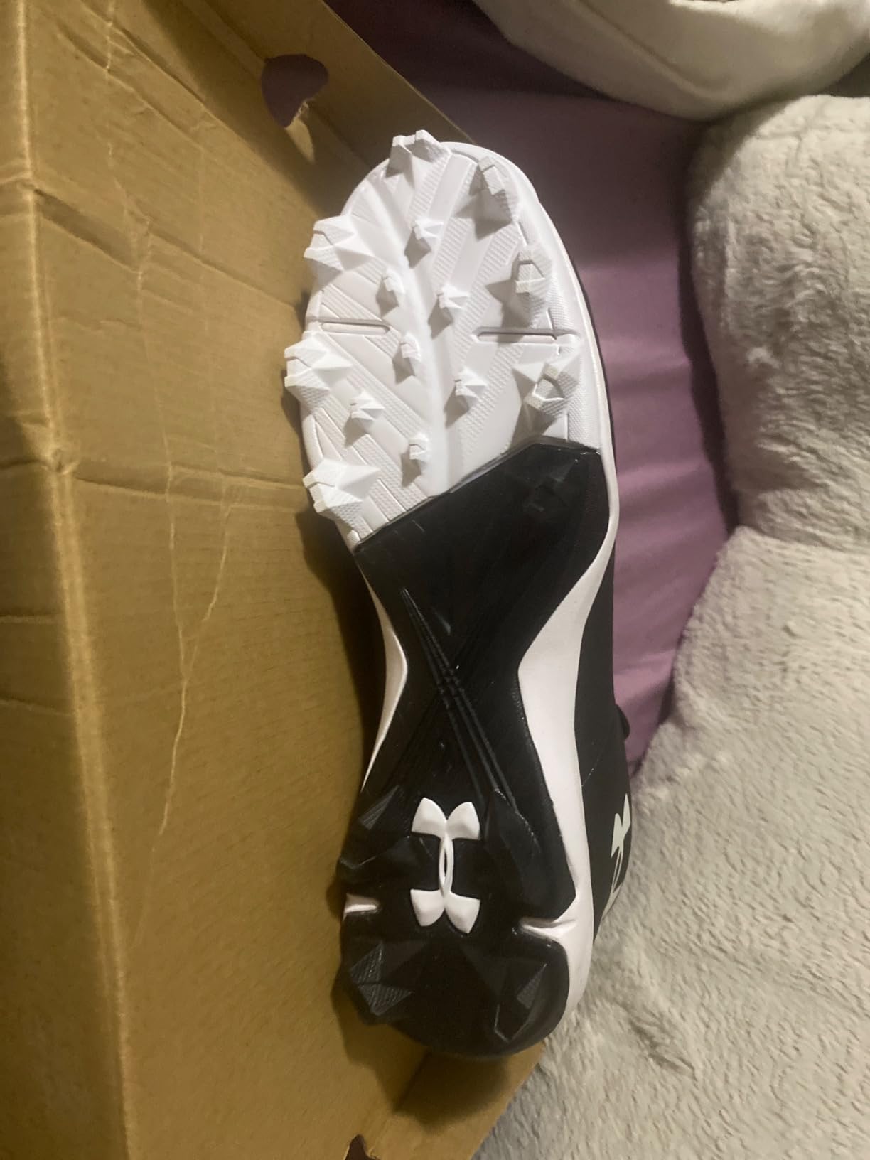 Multiple colorway options of Under Armour Glyde 2.0 RM softball cleats showing style variety available