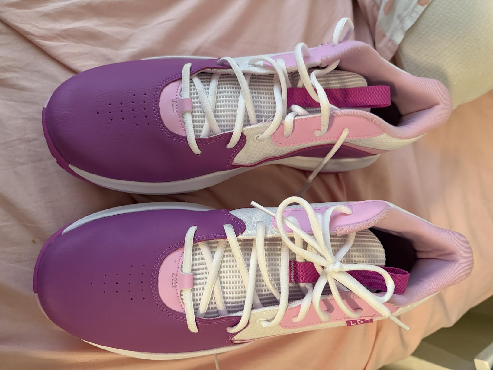 Under Armour Lockdown 7 showing multiple colorway options and overall basketball shoe design