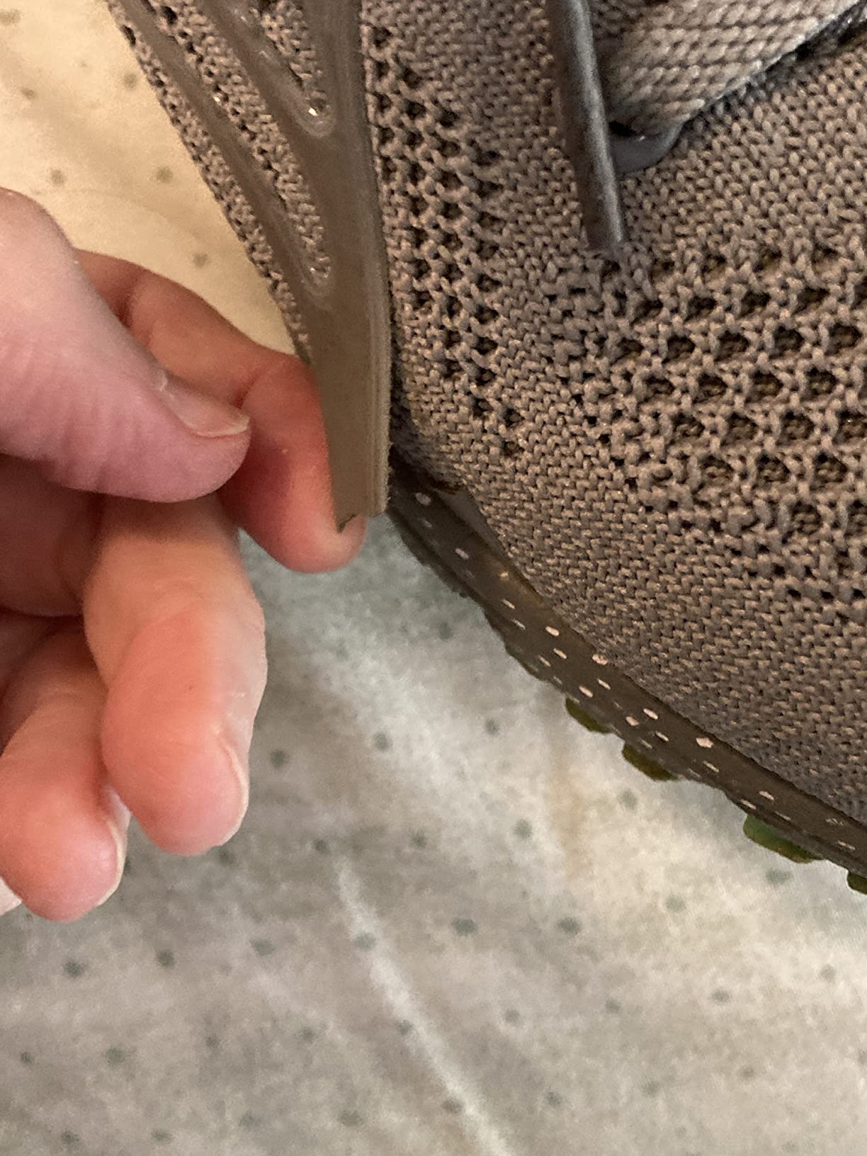 Side profile view of Lamincoa women's running shoe showing air cushion midsole and rubber outsole traction pattern