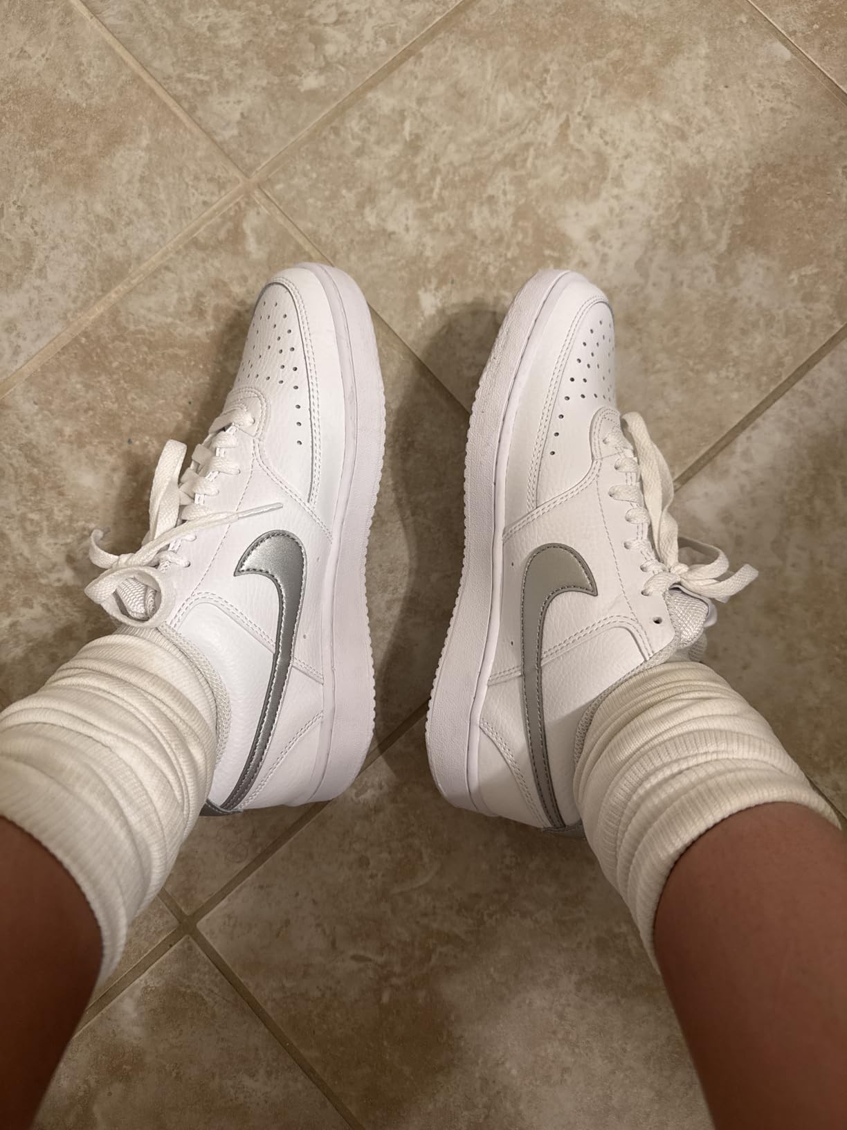 Nike Women's Air Force 1 white sneakers classic basketball silhouette side view