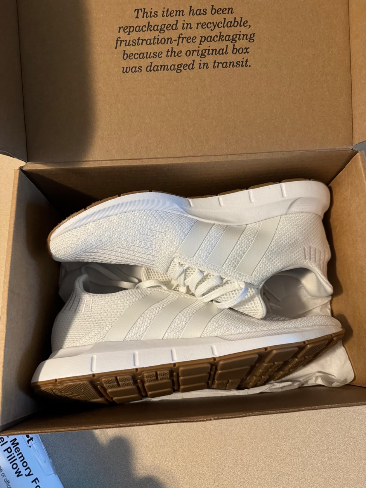 Side profile of Adidas Swift Run showing EVA midsole thickness and overall low-profile proportions
