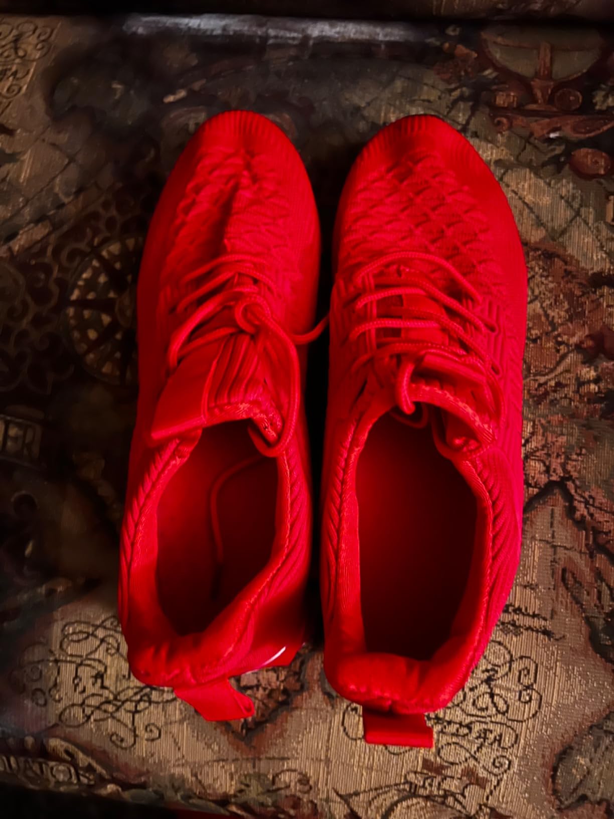 Red colorway Kvovzo blade shoes after extended testing period showing wear patterns and traction elements