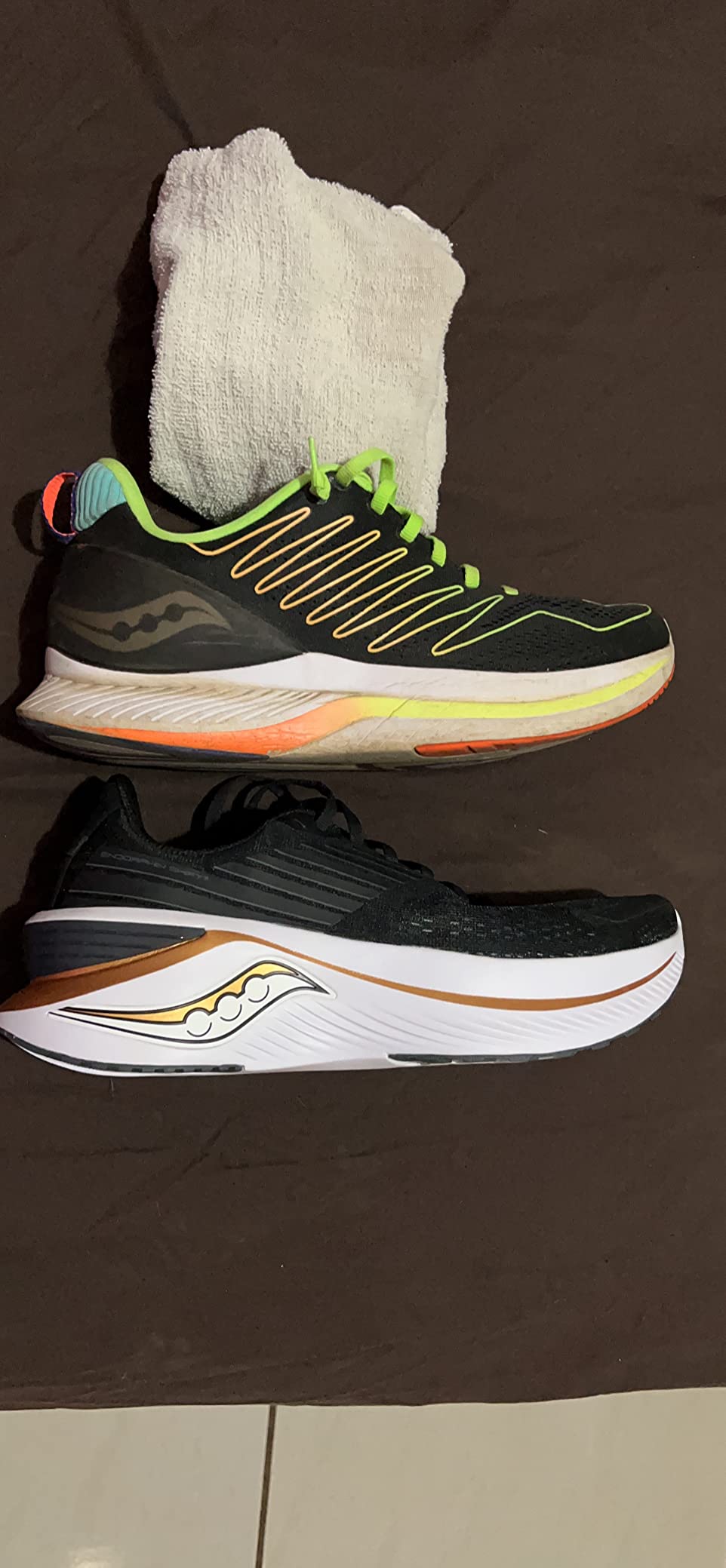Saucony Endorphin Shift 3 in action during easy-pace running showing heel-to-toe transition