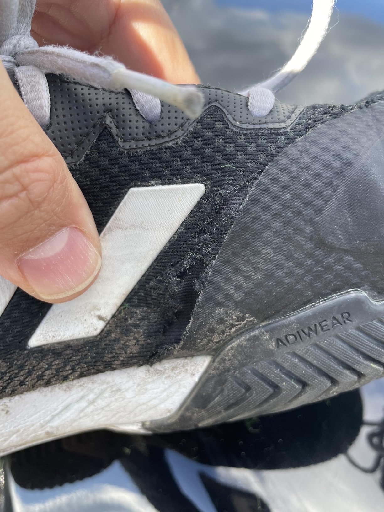 Adidas Gamecourt M construction detail showing synthetic upper material quality and build for tennis