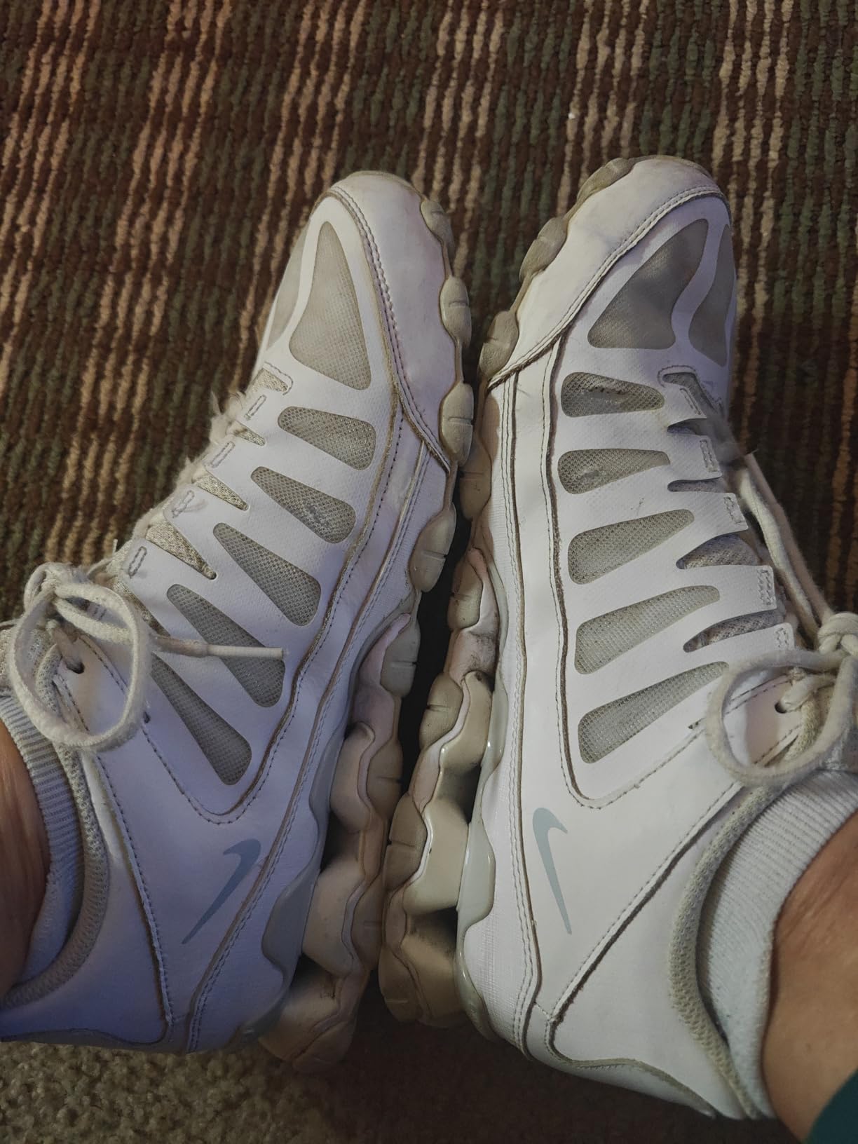 Close-up of Nike Reax 8 TR heel cushioning columns showing TPU column construction and EVA midsole interface