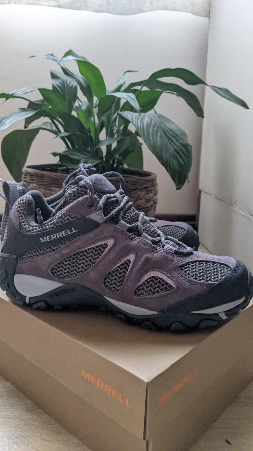 Side profile of Merrell Women's Yokota 2 showing low-cut silhouette, TPU heel counter, and overall build