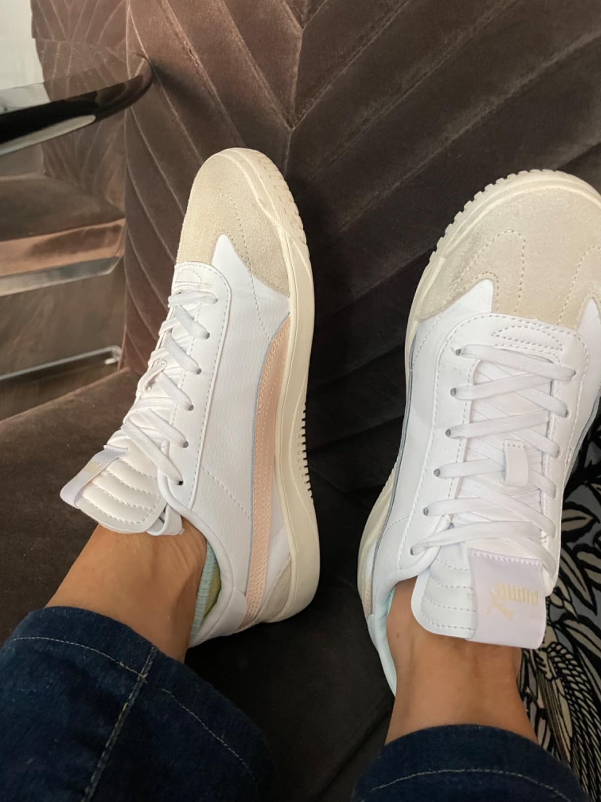 PUMA Club 5v5 in city walking context showing real-world durability and performance on urban surfaces