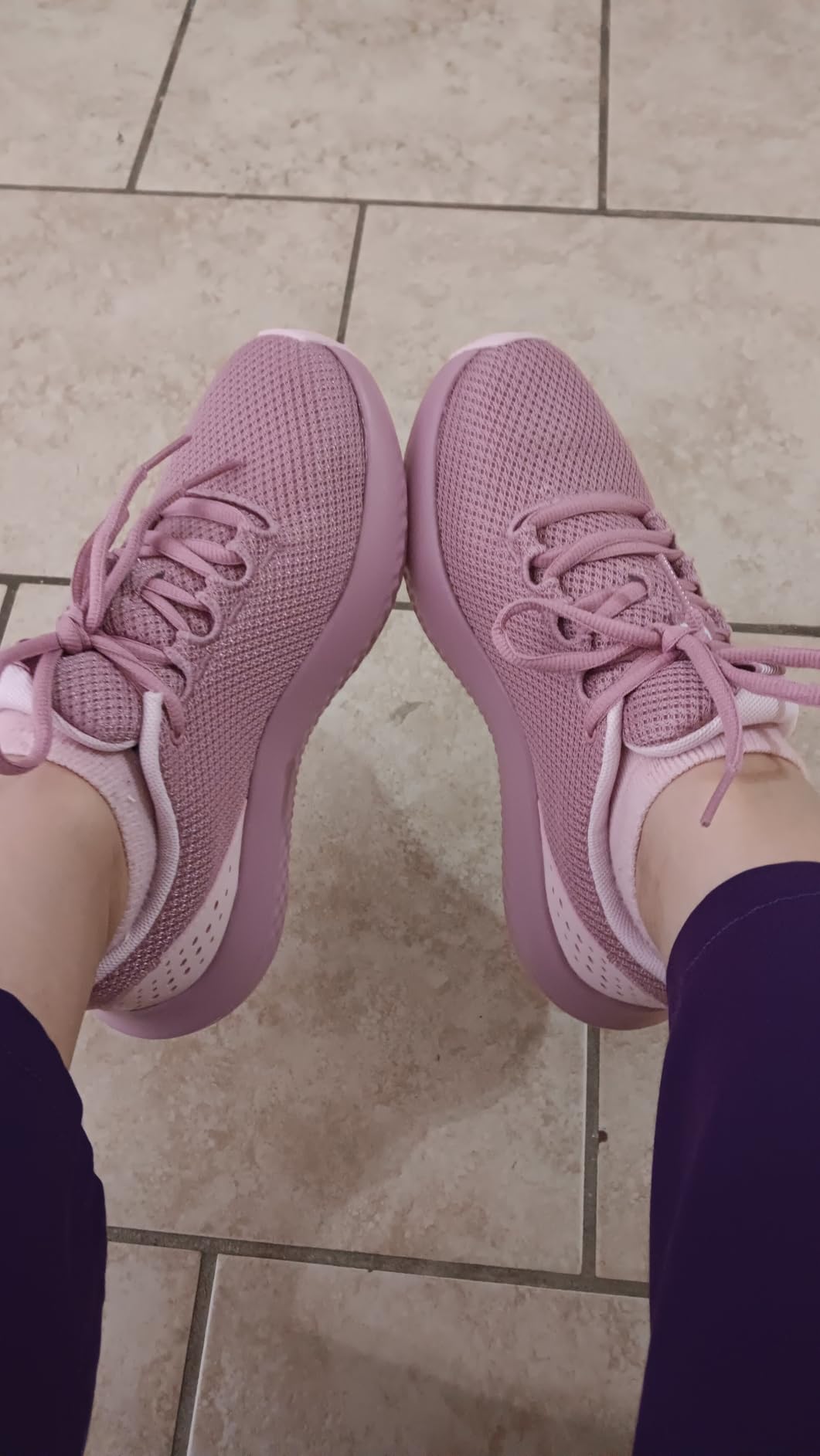 Close-up of Under Armour Charged Surge 4 ankle collar showing enhanced 7.8mm cushioning that prevents lace-bite during long wear