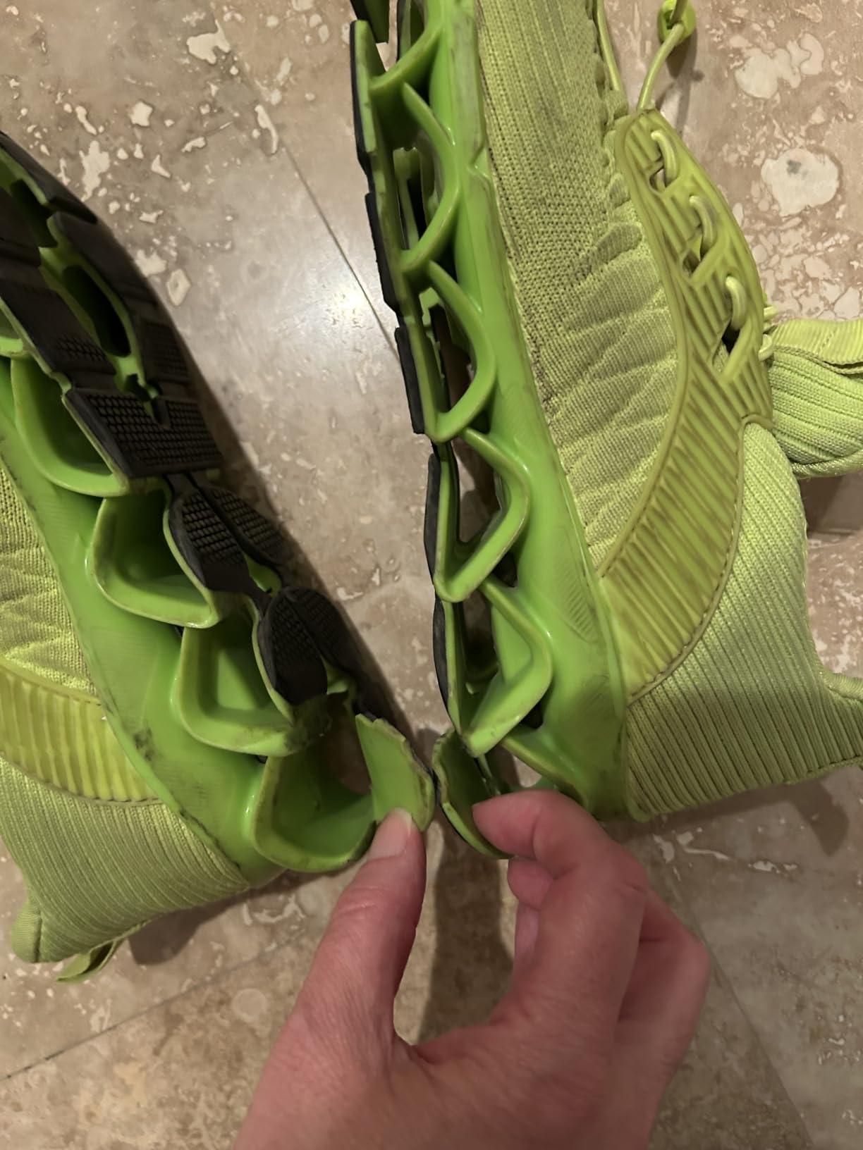 Detail shot of Srenket blade sneakers showing the bond area between mesh upper and lattice sole where separation issues develop