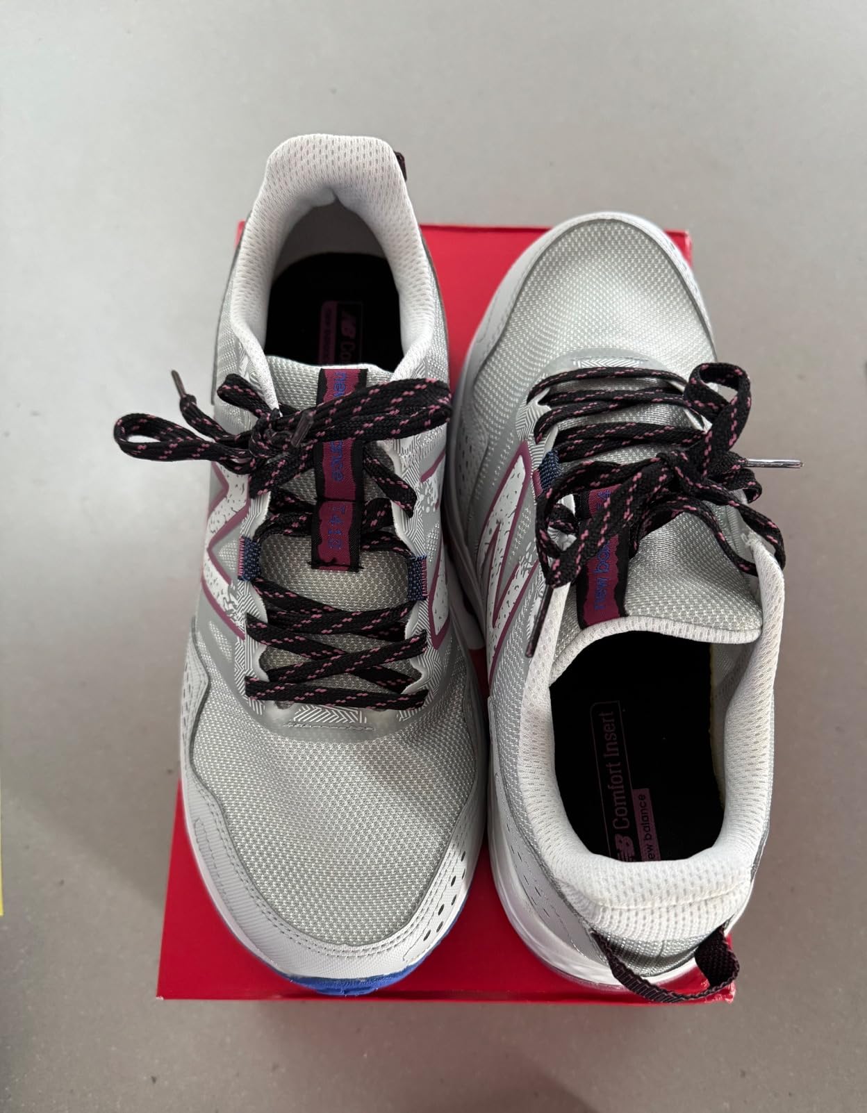 New Balance 410 V8 side profile showing mesh panel structure and BIO Foam midsole thickness
