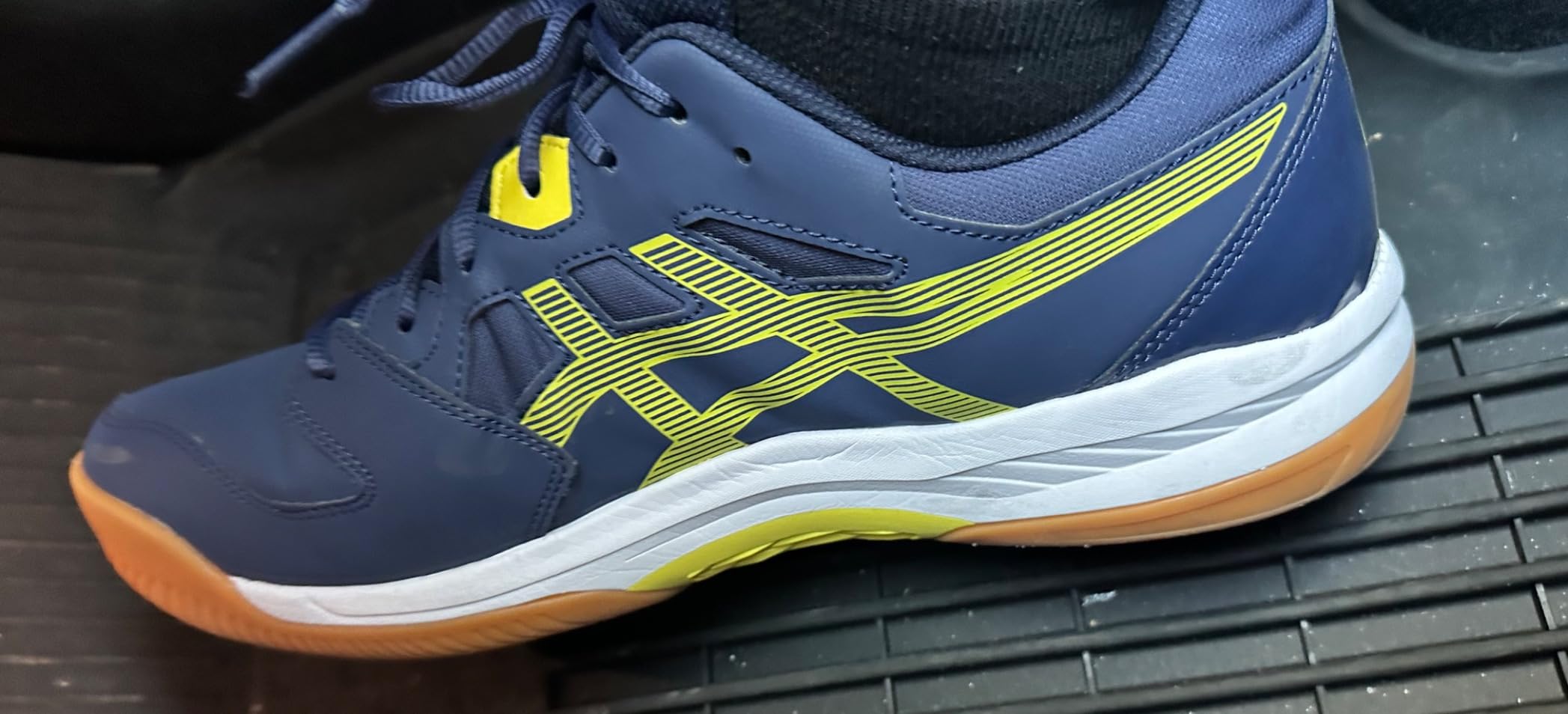 ASICS Gel-RENMA in action on pickleball court showing lateral stability during gameplay