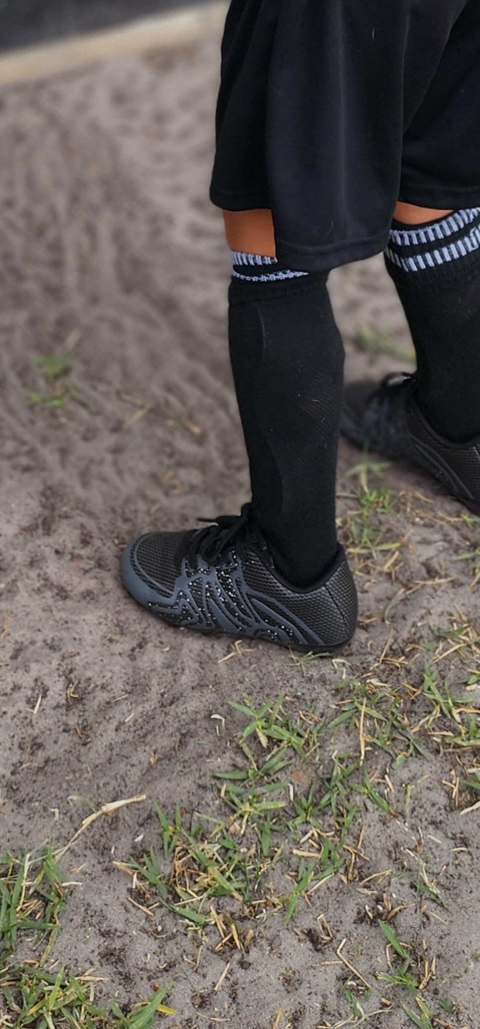 DREAM PAIRS youth soccer cleats worn during competitive game showing real-world durability