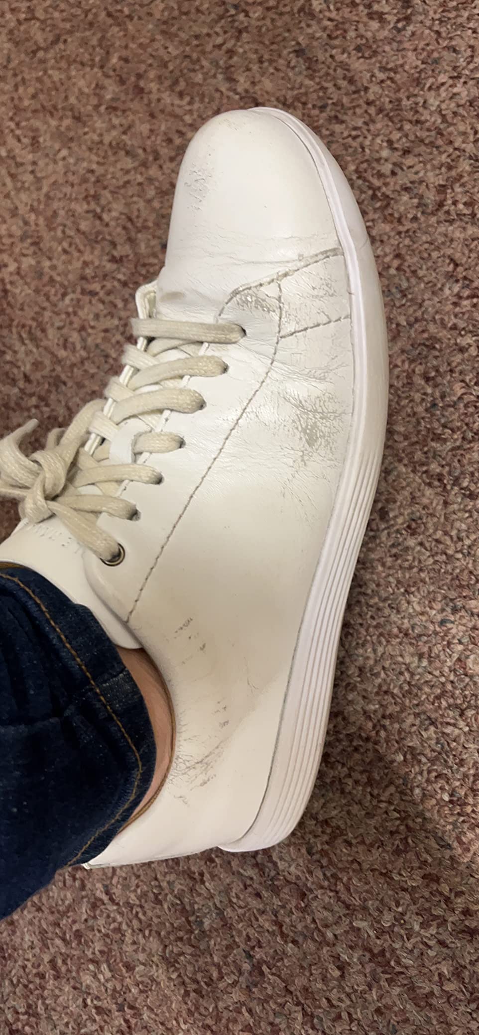 Cole Haan Grand Crosscourt white coating showing wear and peeling after extended use