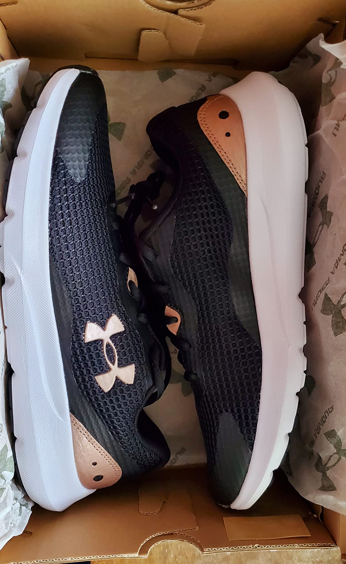 Close-up of Under Armour Surge 3 mesh upper showing breathable construction and synthetic overlay detail