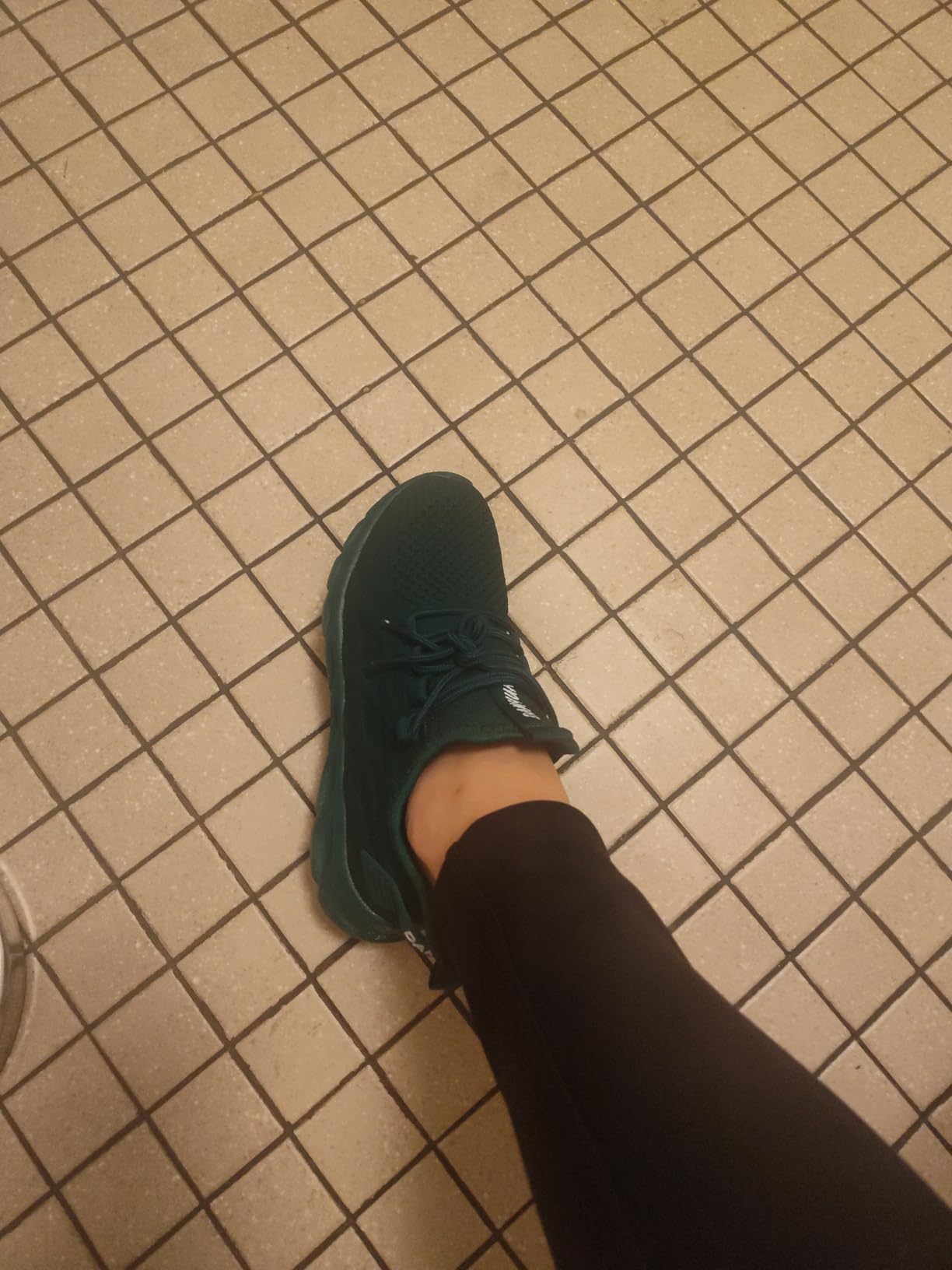 Detail of DLWKIPV mesh fabric texture showing fine knit weave engineered for breathability and lightweight comfort