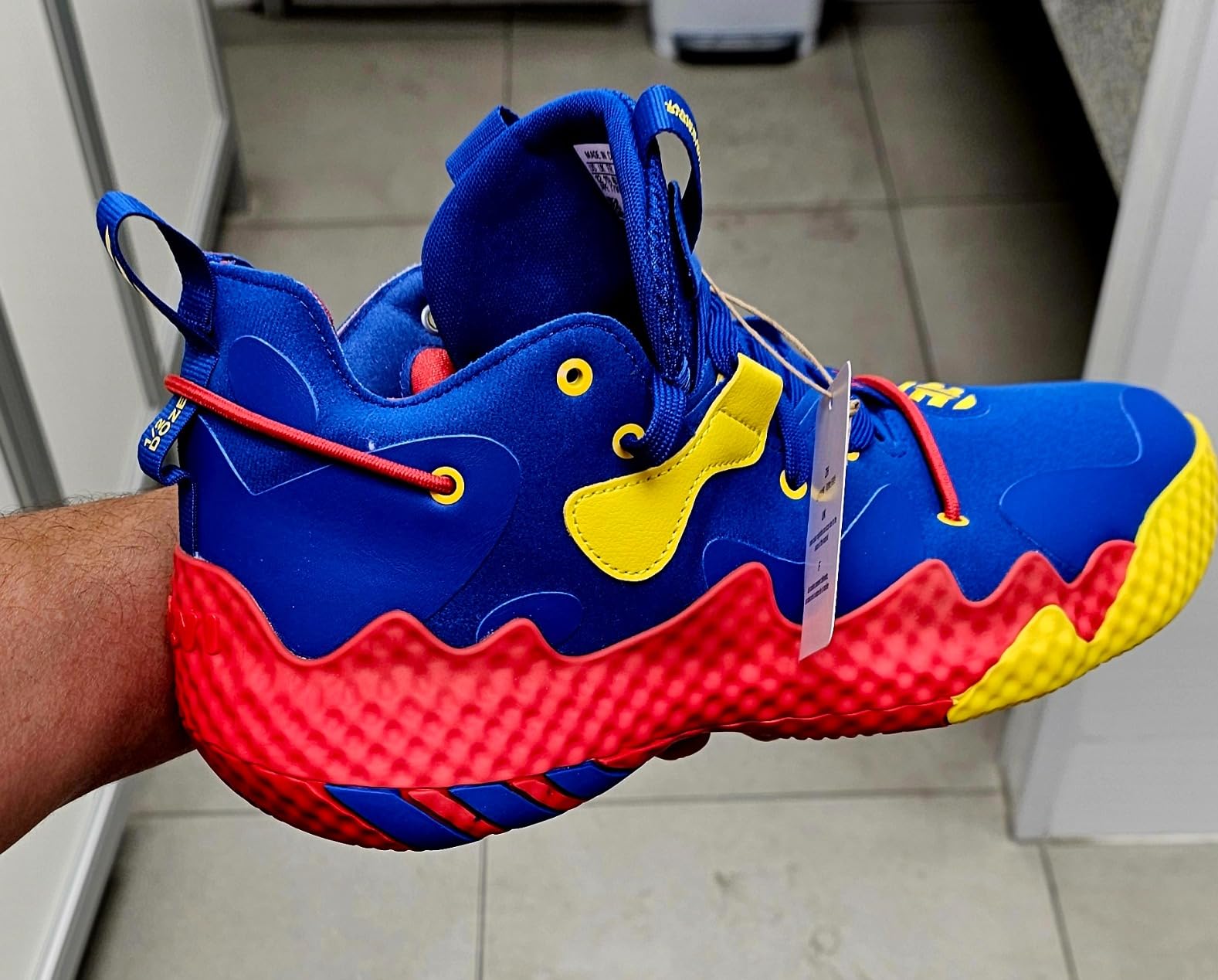 Adidas Harden Vol. 6 side profile showing full-length Boost midsole, ankle collar padding and Infinity Bar torsional support