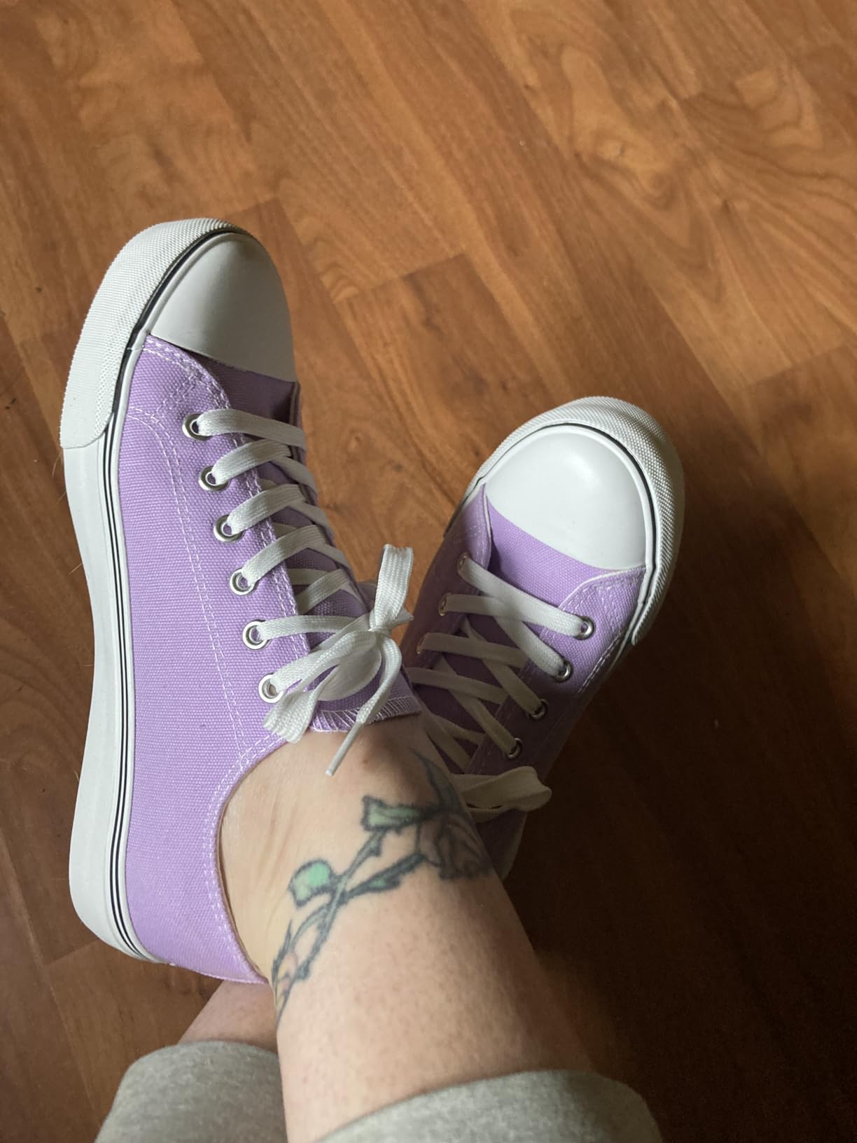 FRACORA canvas sneakers beside classic Converse Chuck Taylor — visual comparison of budget versus premium canvas