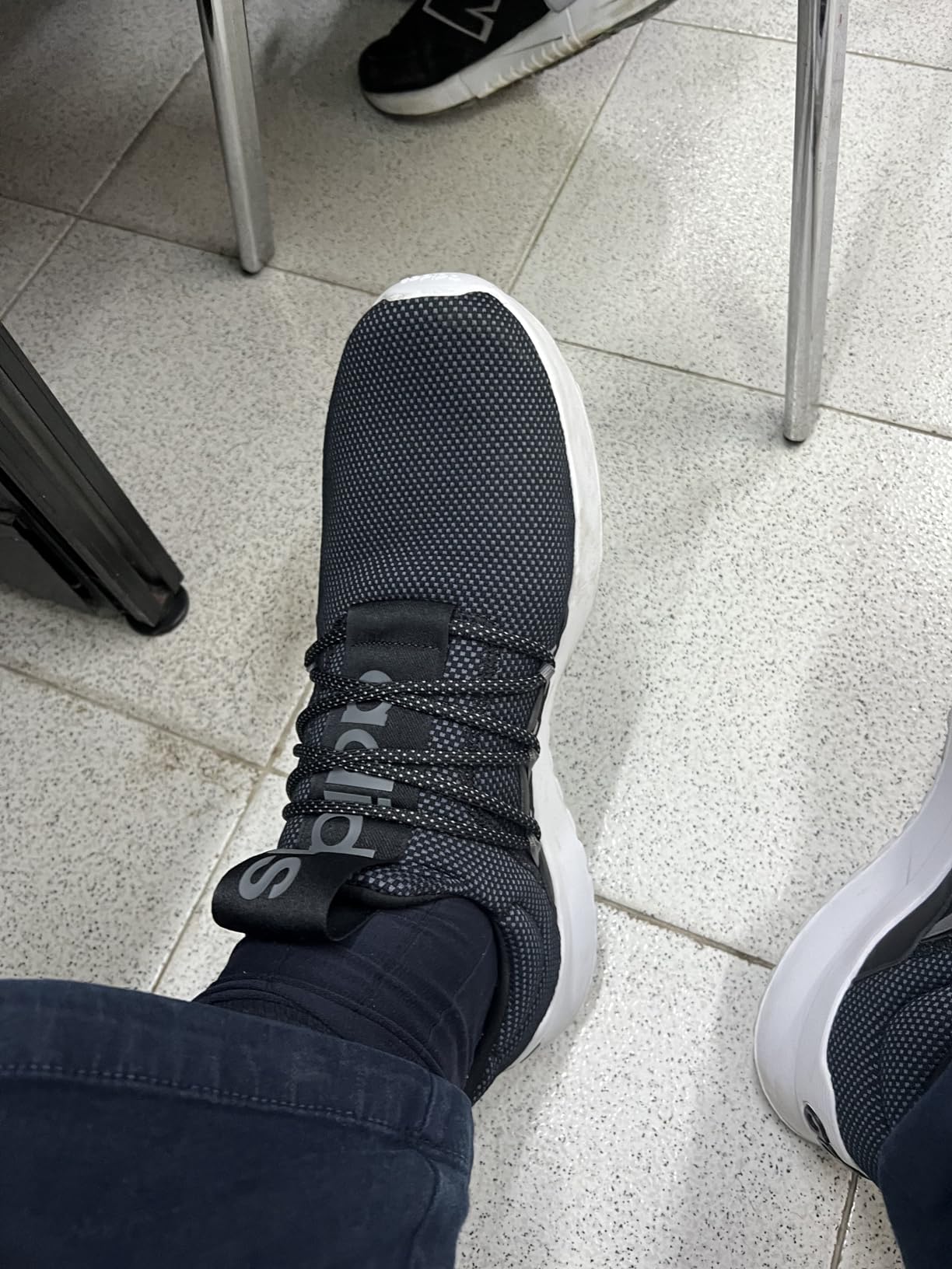 Full profile view of Adidas Men's Lite Racer Adapt 5.0 showing overall design proportions
